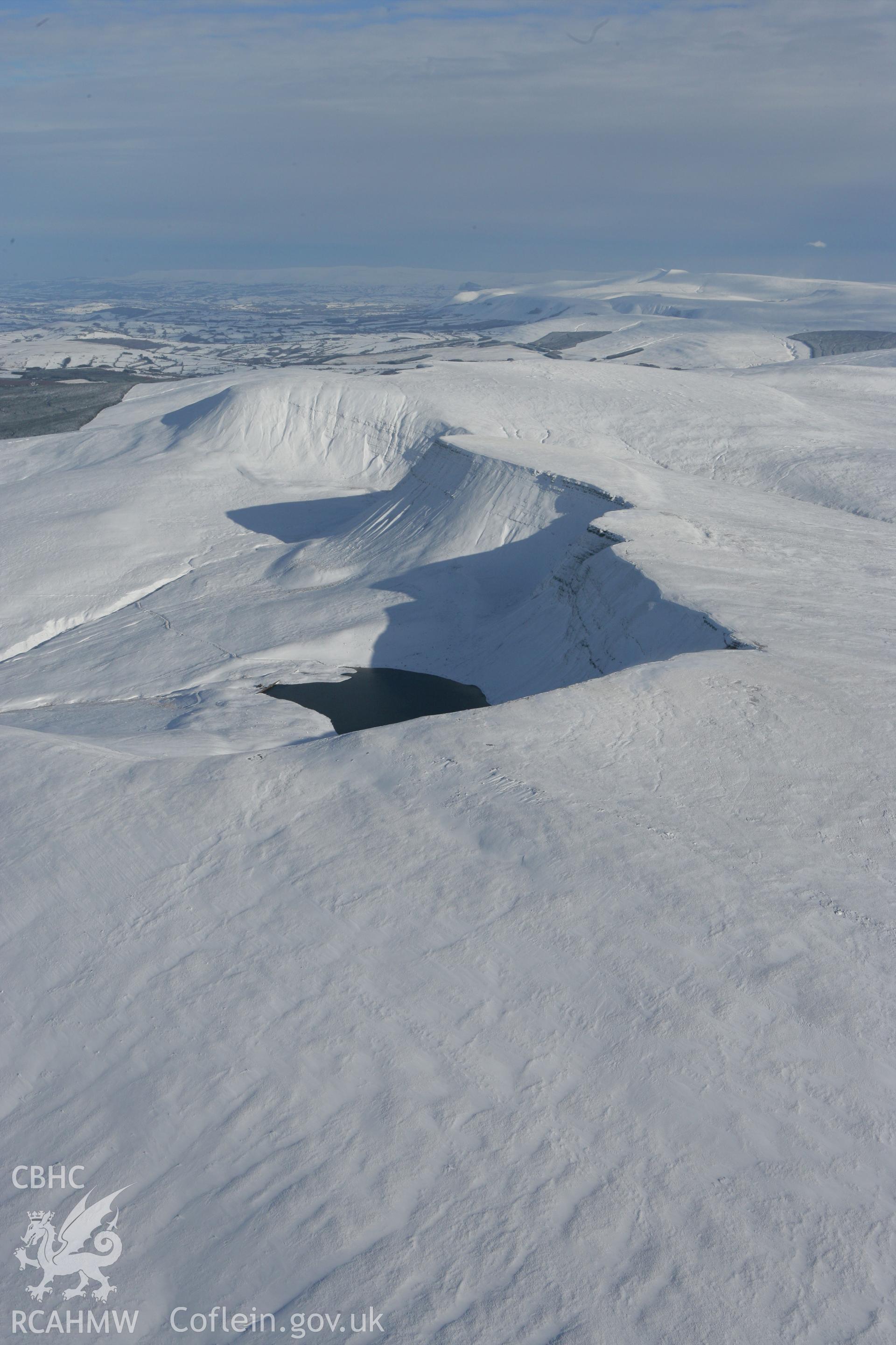 RCAHMW colour oblique photograph of Llyn y Fan Fach, winter landscape. Taken by Toby Driver on 06/02/2009.