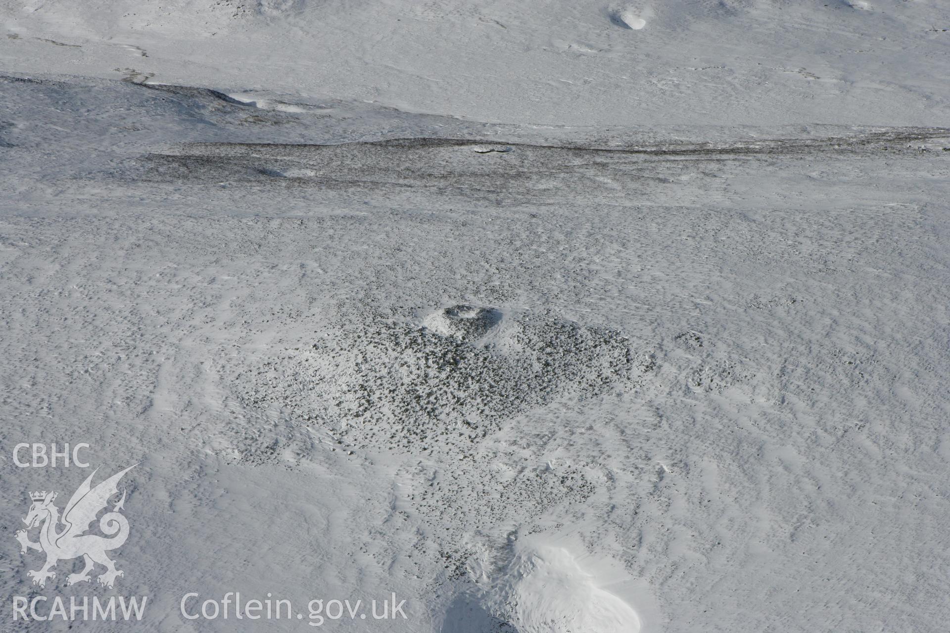 RCAHMW colour oblique photograph of Tair Carn Isaf, north cairn. Taken by Toby Driver on 06/02/2009.