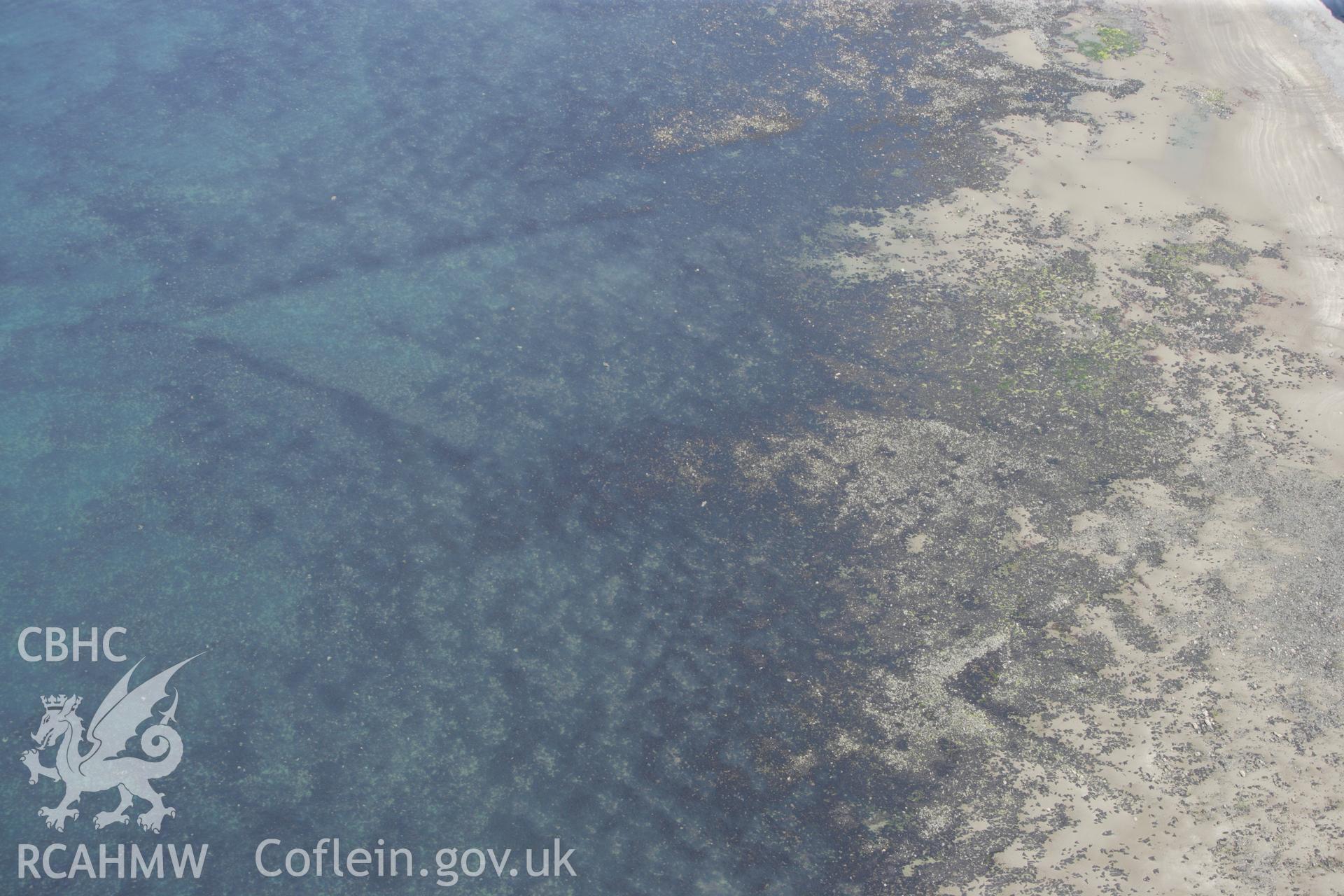 RCAHMW colour oblique aerial photograph of Mynachdy'r-Graig Fish Trap I. Taken on 02 June 2009 by Toby Driver