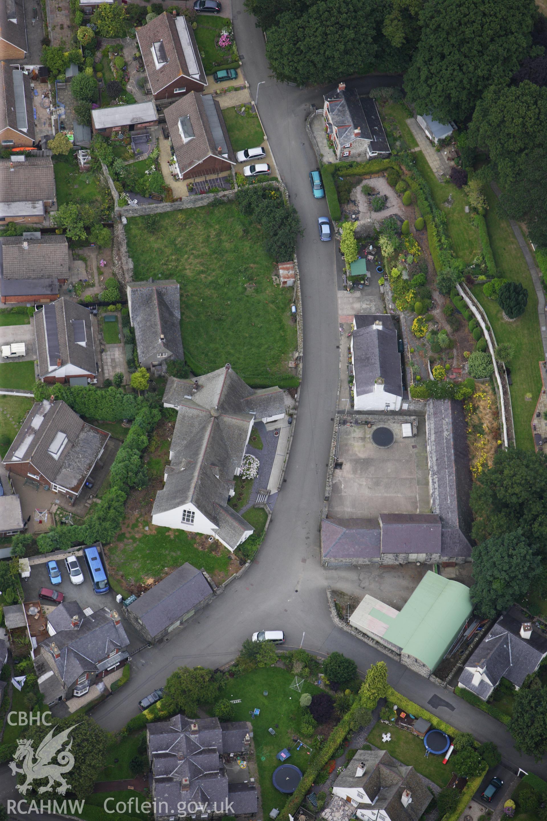 RCAHMW colour oblique aerial photograph of Church Institute, Park Road, Llanfairfechan. Taken on 06 August 2009 by Toby Driver
