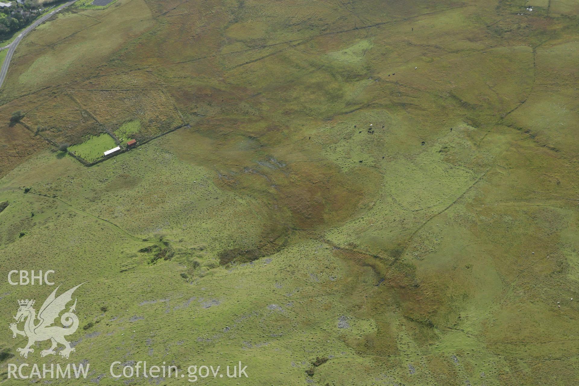 RCAHMW colour oblique aerial photograph of Craig Derlwyn Enclosure. Taken on 14 October 2009 by Toby Driver
