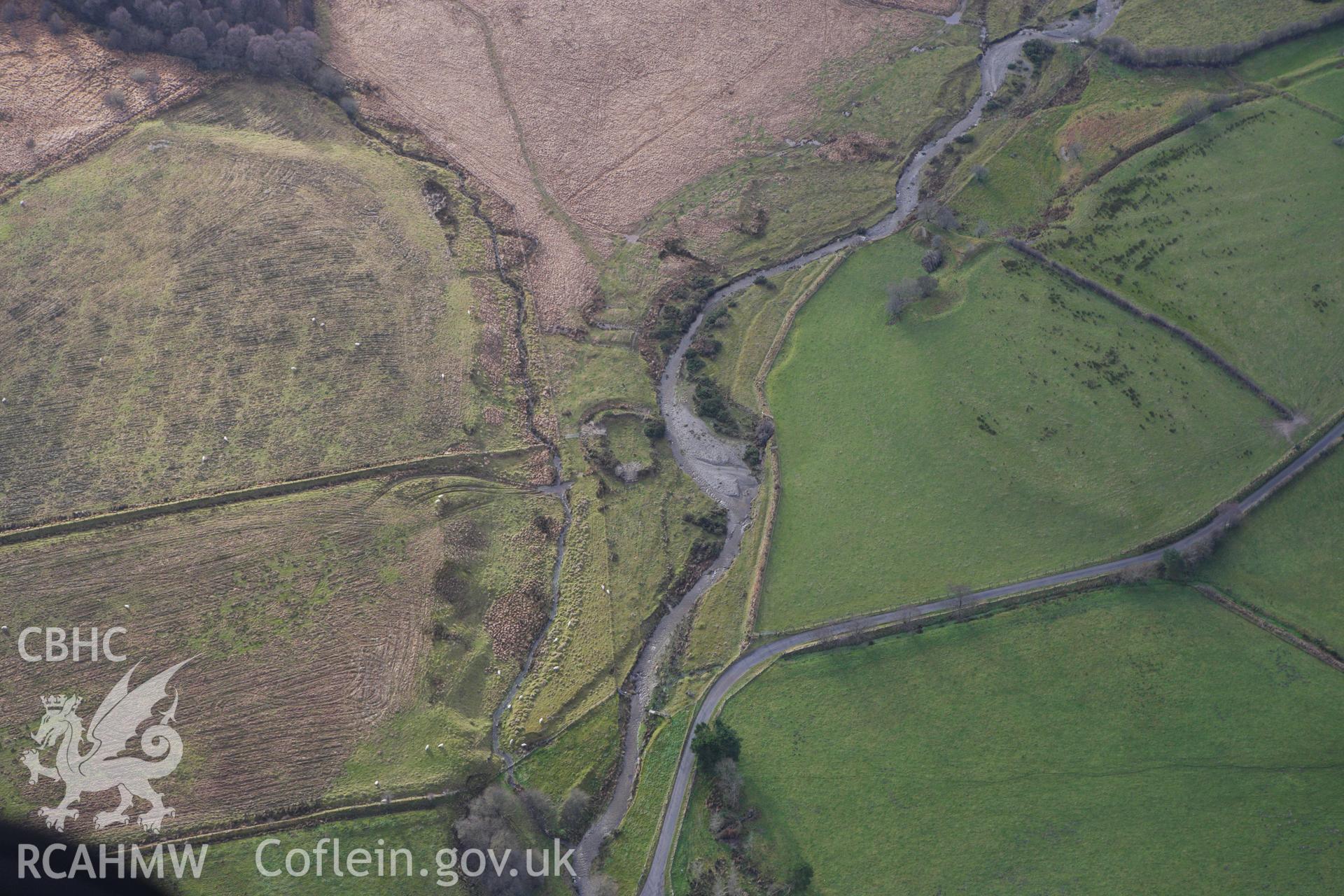 RCAHMW colour oblique aerial photograph of Cefn Llech Enclosure. Taken on 10 December 2009 by Toby Driver