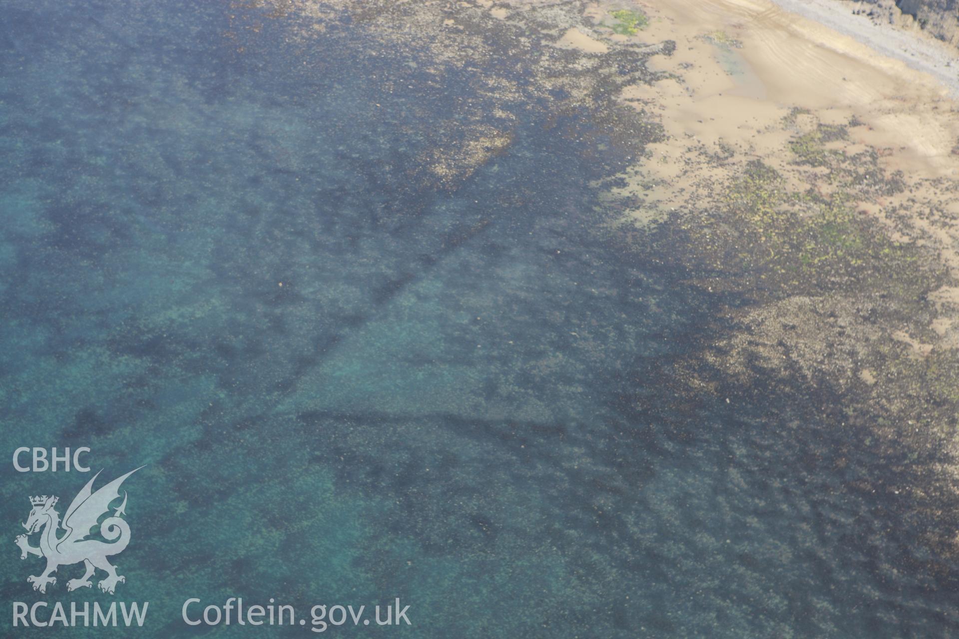 RCAHMW colour oblique aerial photograph of Mynachdy'r-Graig Fish Trap I. Taken on 02 June 2009 by Toby Driver