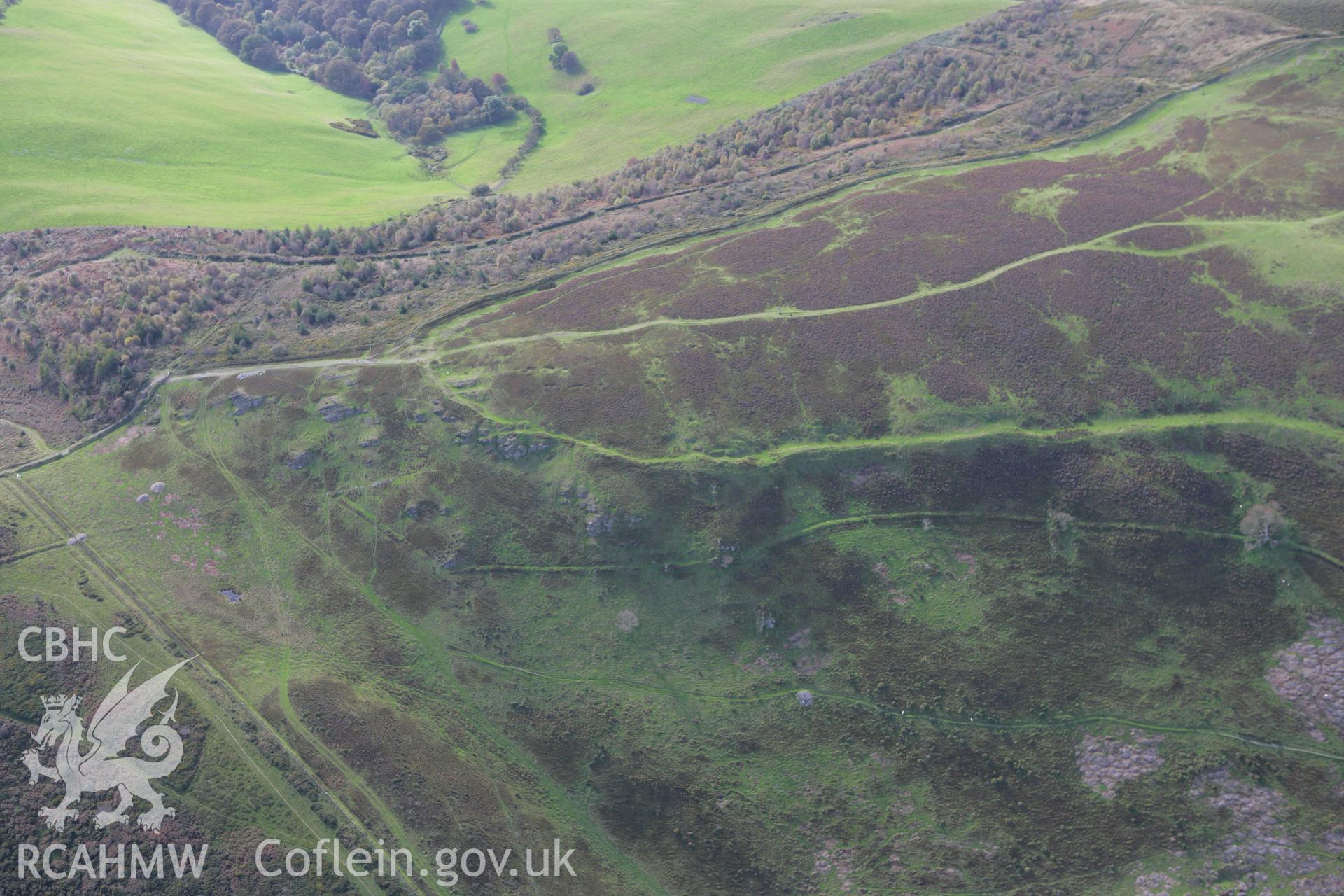 RCAHMW colour oblique aerial photograph of Penycloddiau Hillfort. Taken on 13 October 2009 by Toby Driver