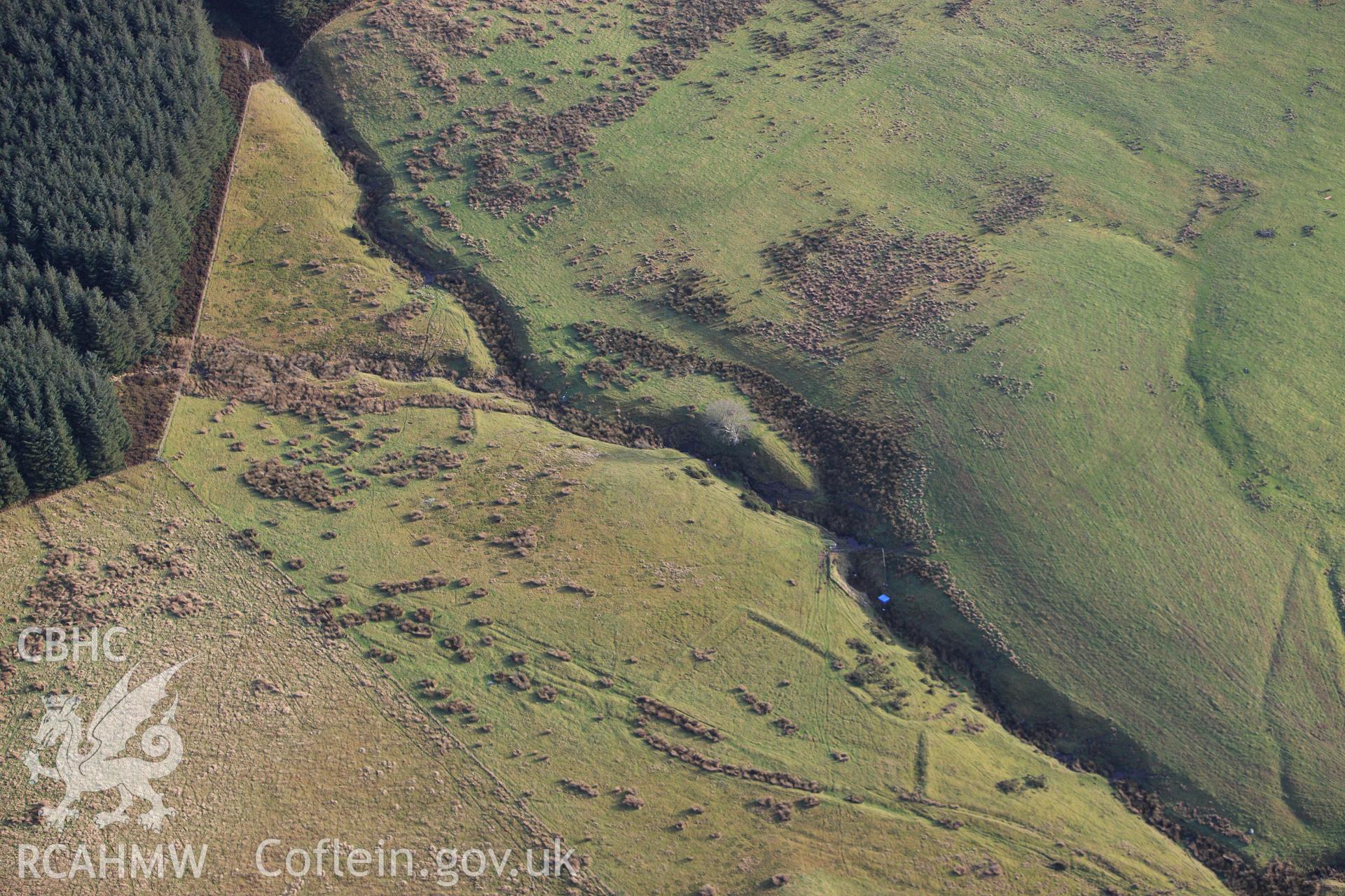 RCAHMW colour oblique aerial photograph of Hafod Nant y Griafolen Hut and Enclosure VI, deserted rural settlement. Taken on 10 December 2009 by Toby Driver