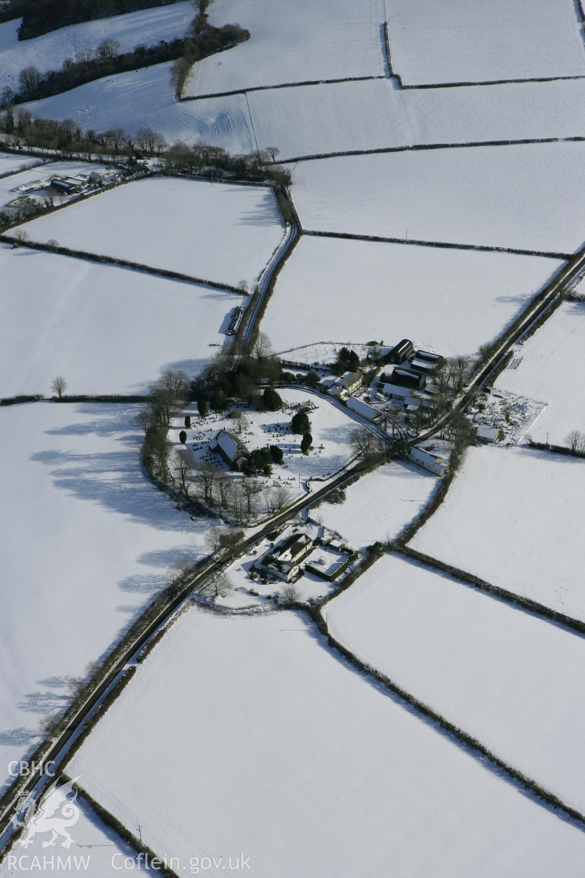 RCAHMW colour oblique photograph of Llanwinio Church, winter landscape. Taken by Toby Driver on 06/02/2009.