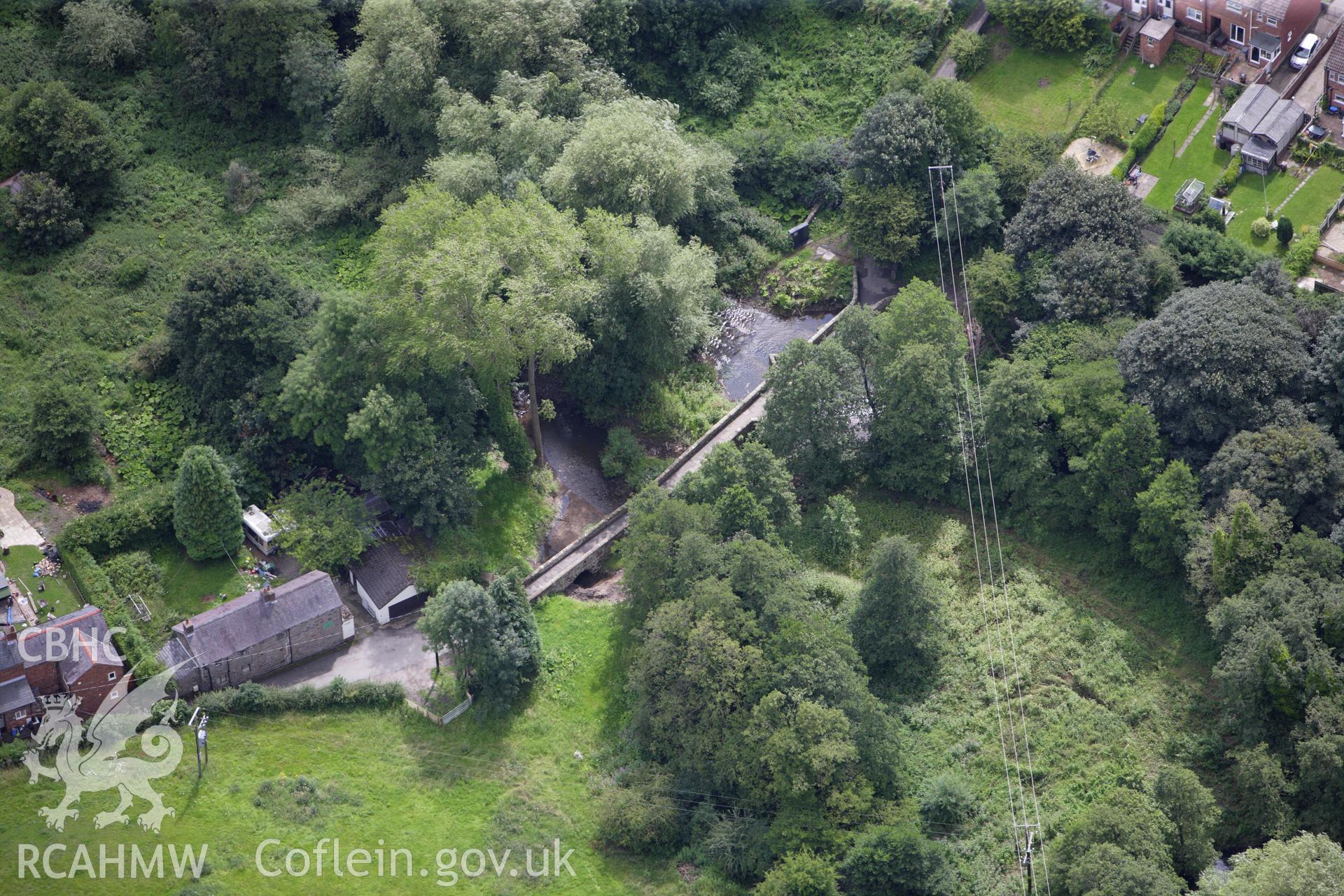 RCAHMW colour oblique aerial photograph of Caergwrle Bridge. Taken on 30 July 2009 by Toby Driver