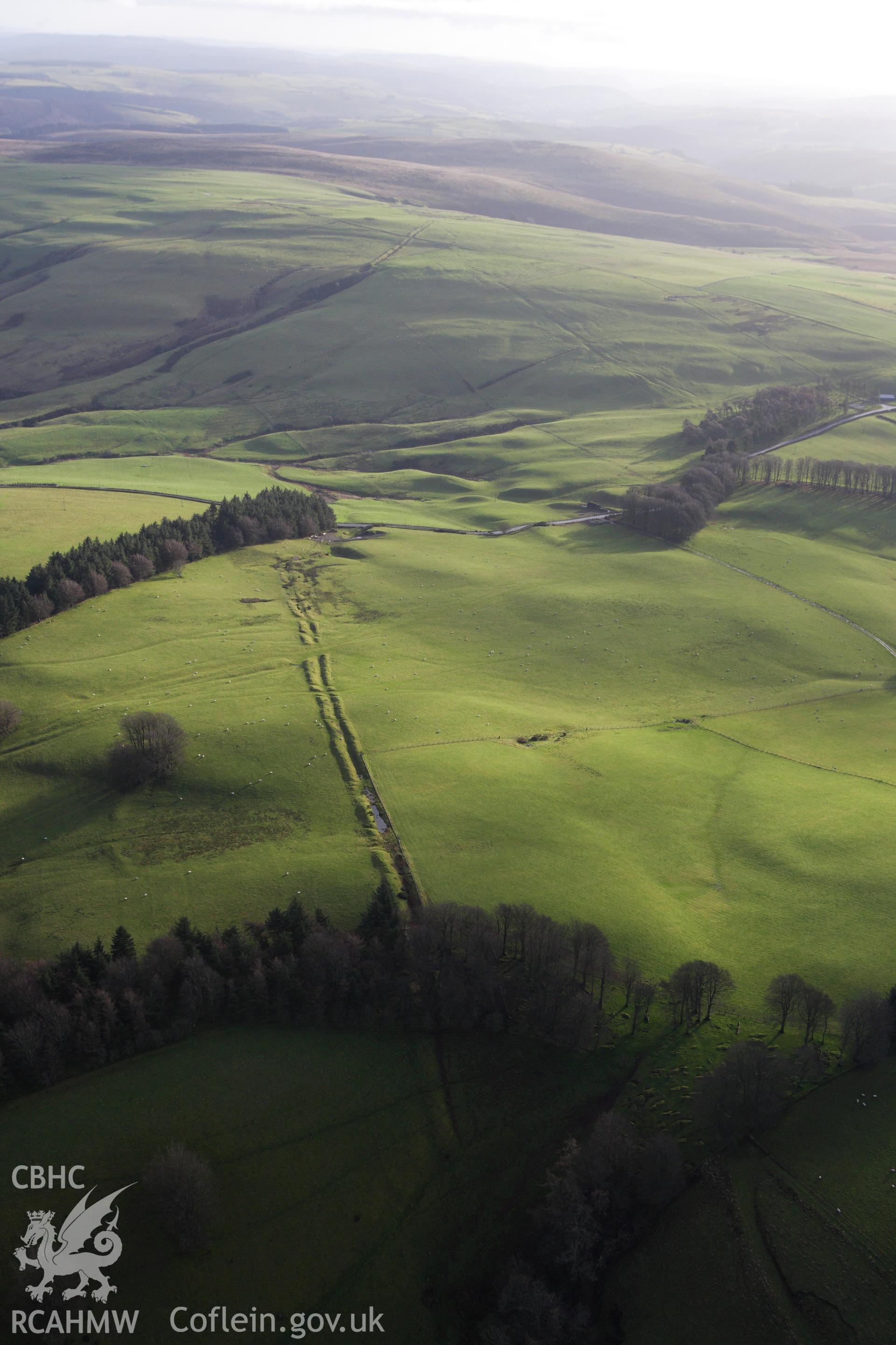 RCAHMW colour oblique aerial photograph of Crugyn Bank Dyke. Taken on 10 December 2009 by Toby Driver
