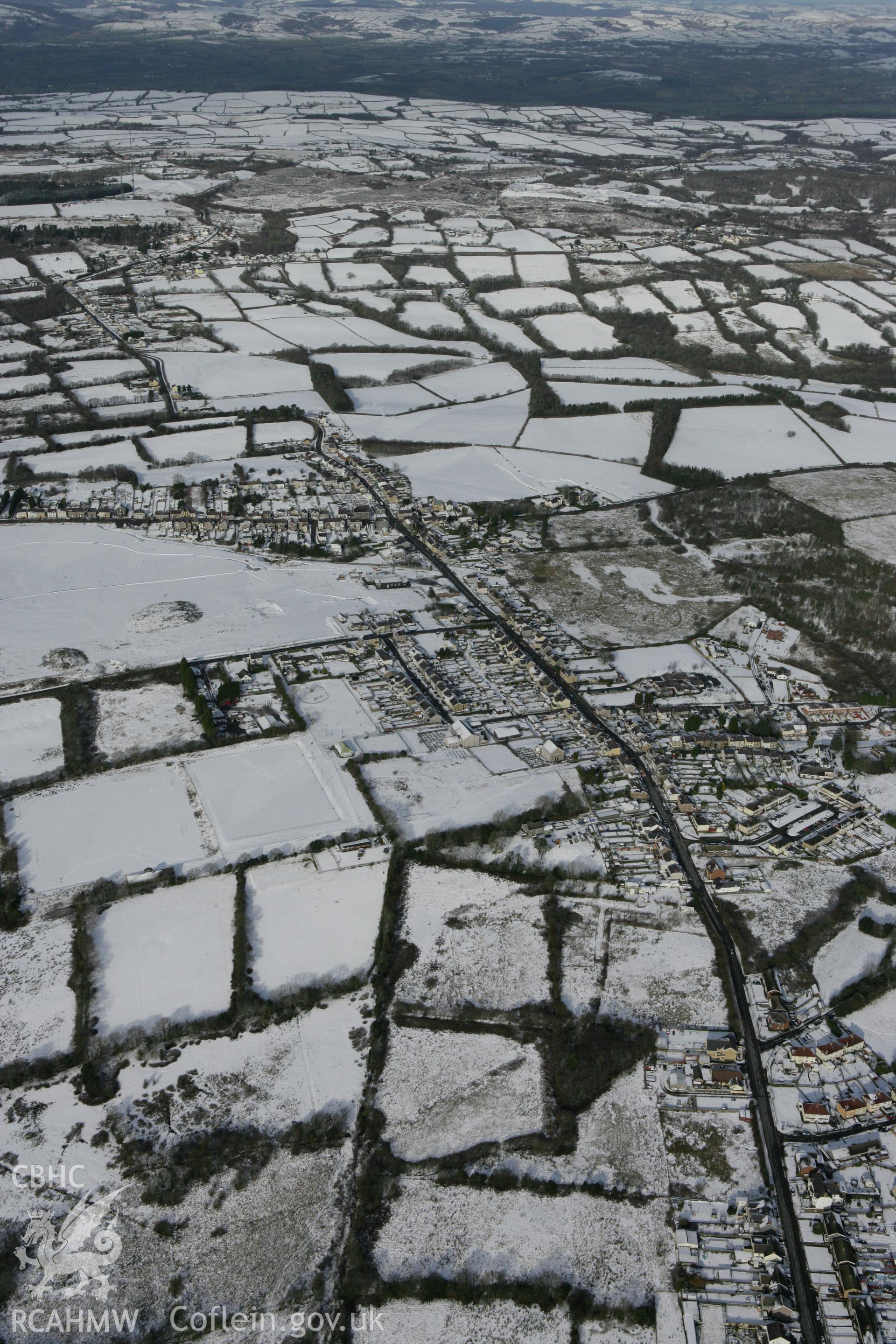RCAHMW colour oblique photograph of Pen y Groes village, showing Emlyn colliery, from the south. Taken by Toby Driver on 06/02/2009.