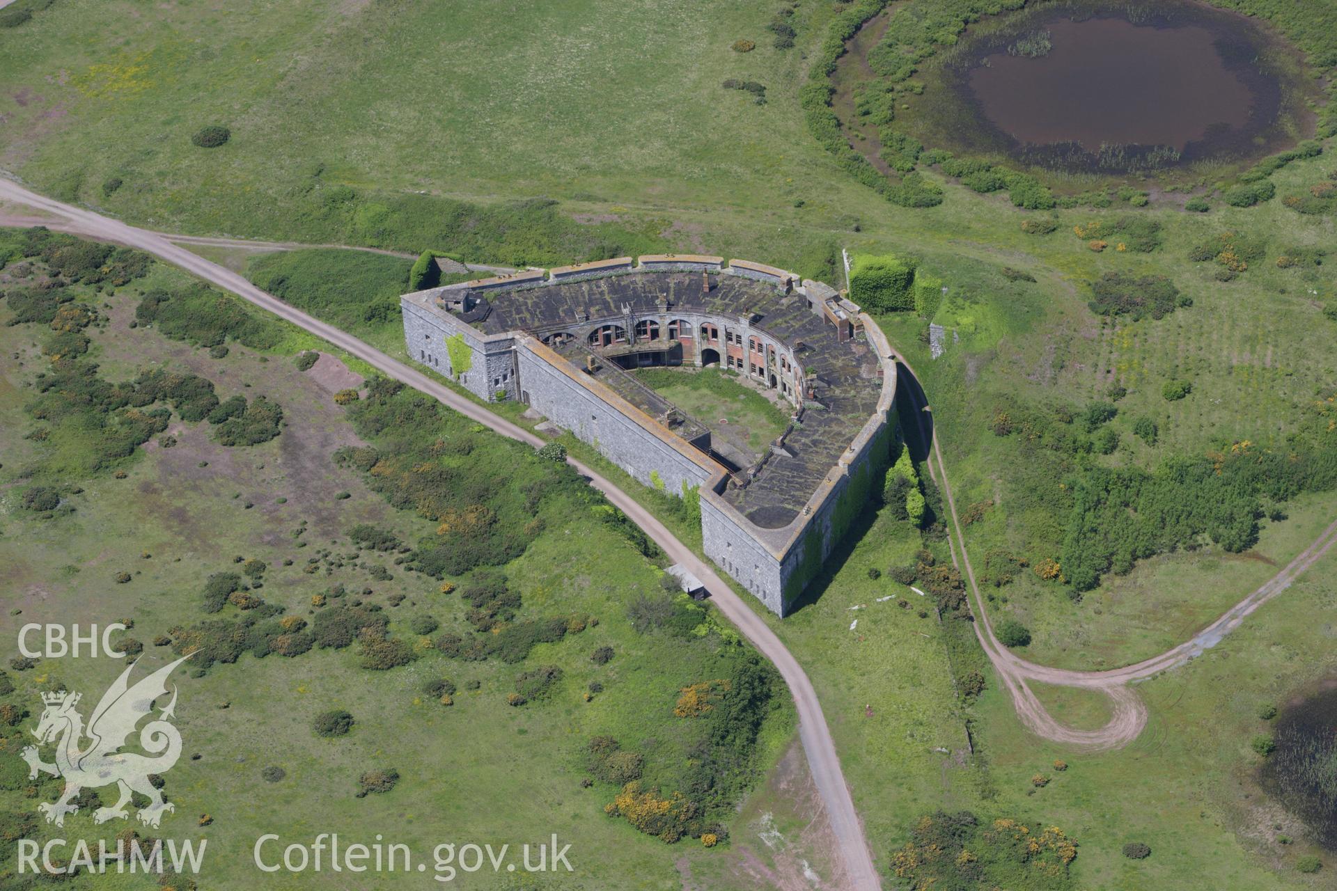 RCAHMW colour oblique aerial photograph of South Hook Fort. Taken on 01 June 2009 by Toby Driver