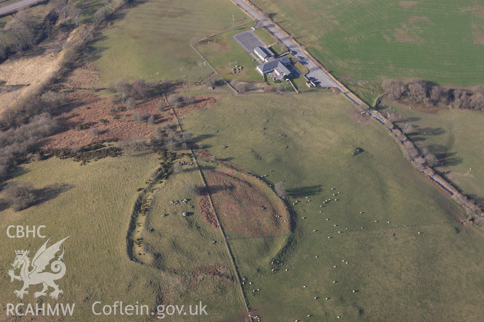 RCAHMW colour oblique photograph of Cefn Ddwysarn camp,. Taken by Toby Driver on 18/03/2009.