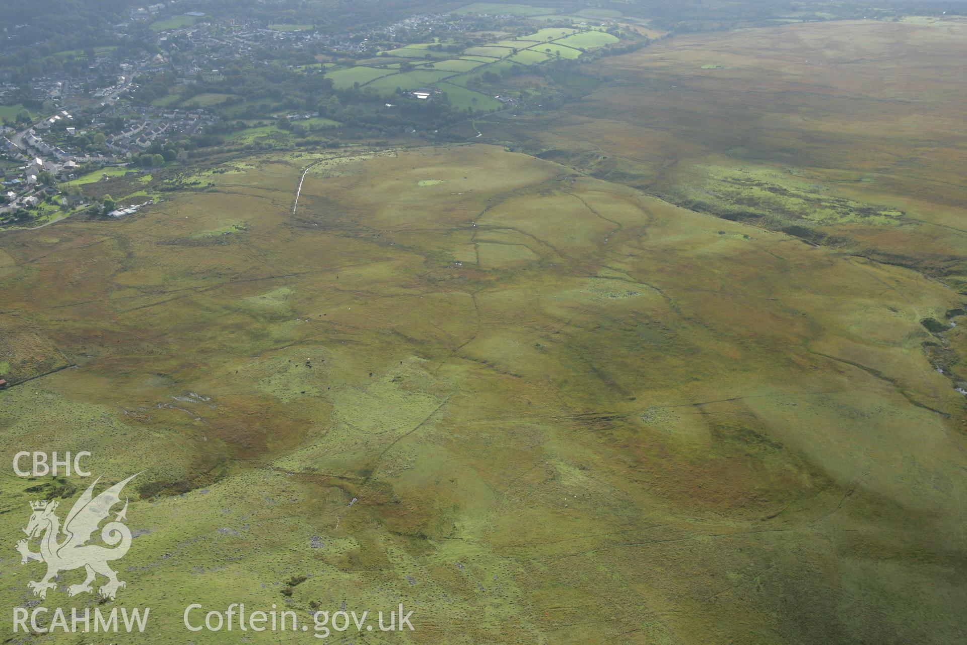 RCAHMW colour oblique aerial photograph of Craig Derlwyn Enclosure. Taken on 14 October 2009 by Toby Driver