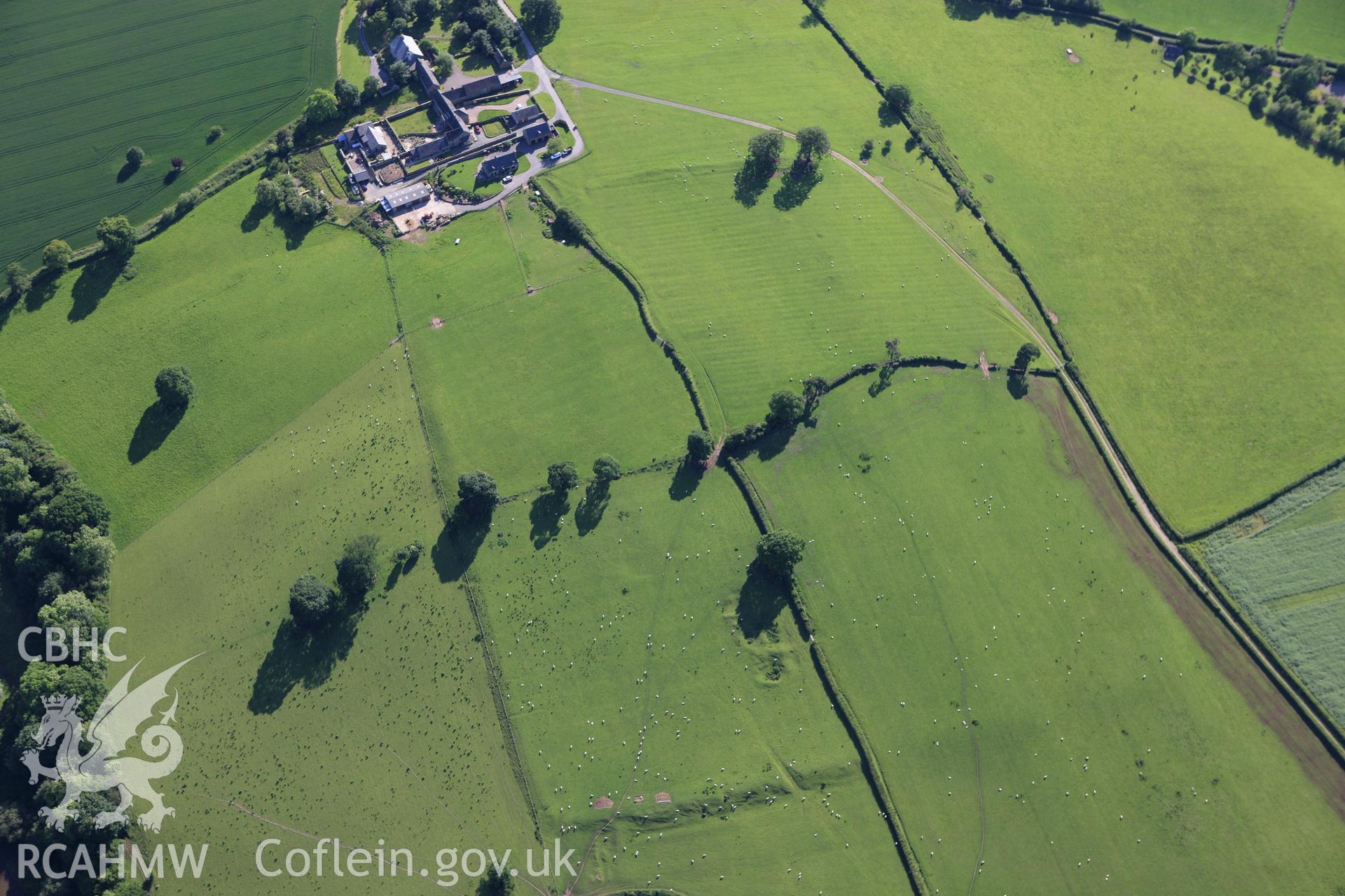 RCAHMW colour oblique aerial photograph of Clyro Roman Fort. Taken on 11 June 2009 by Toby Driver