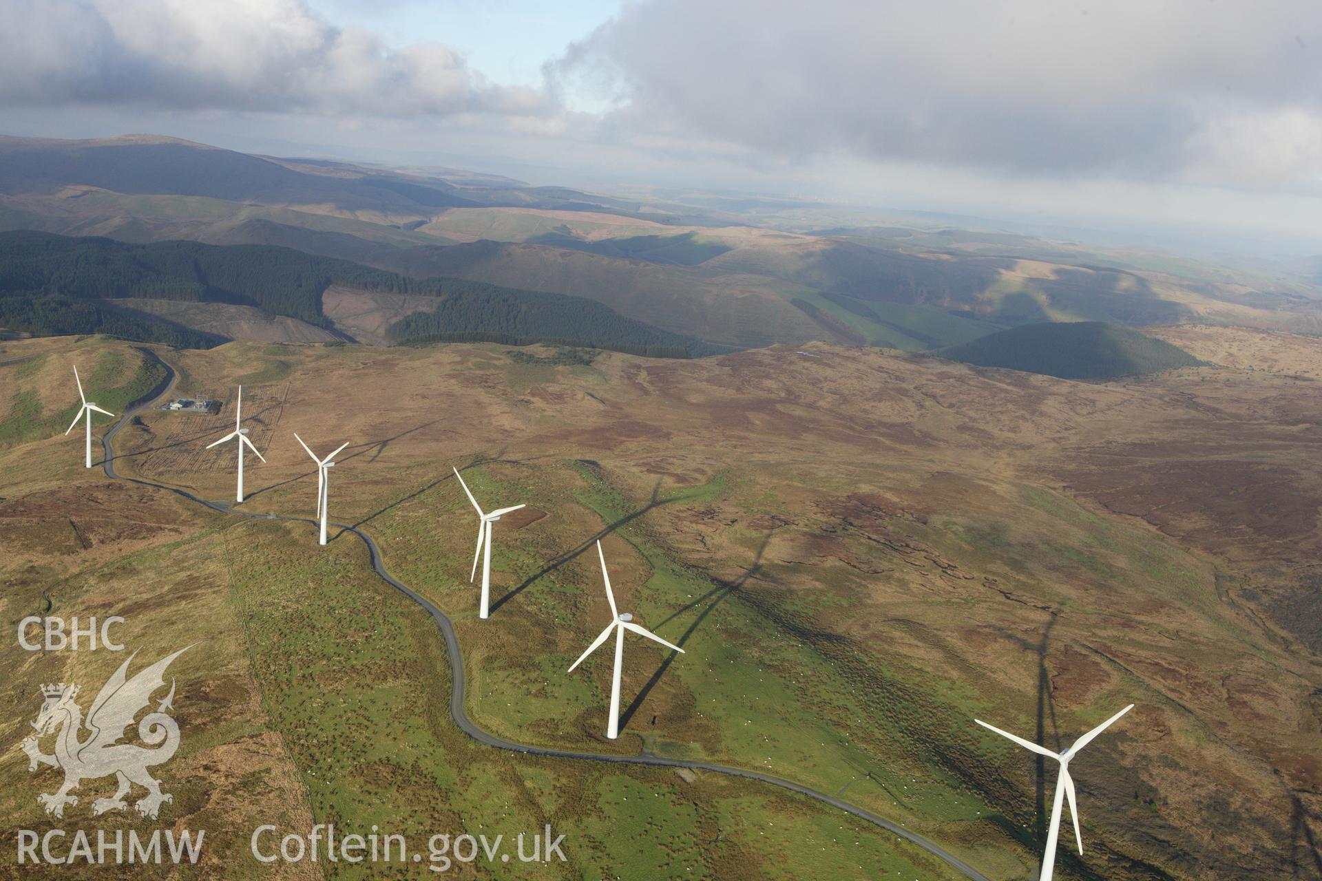 RCAHMW colour oblique aerial photograph of Cefn Croes Wind Farm. Taken on 09 November 2009 by Toby Driver