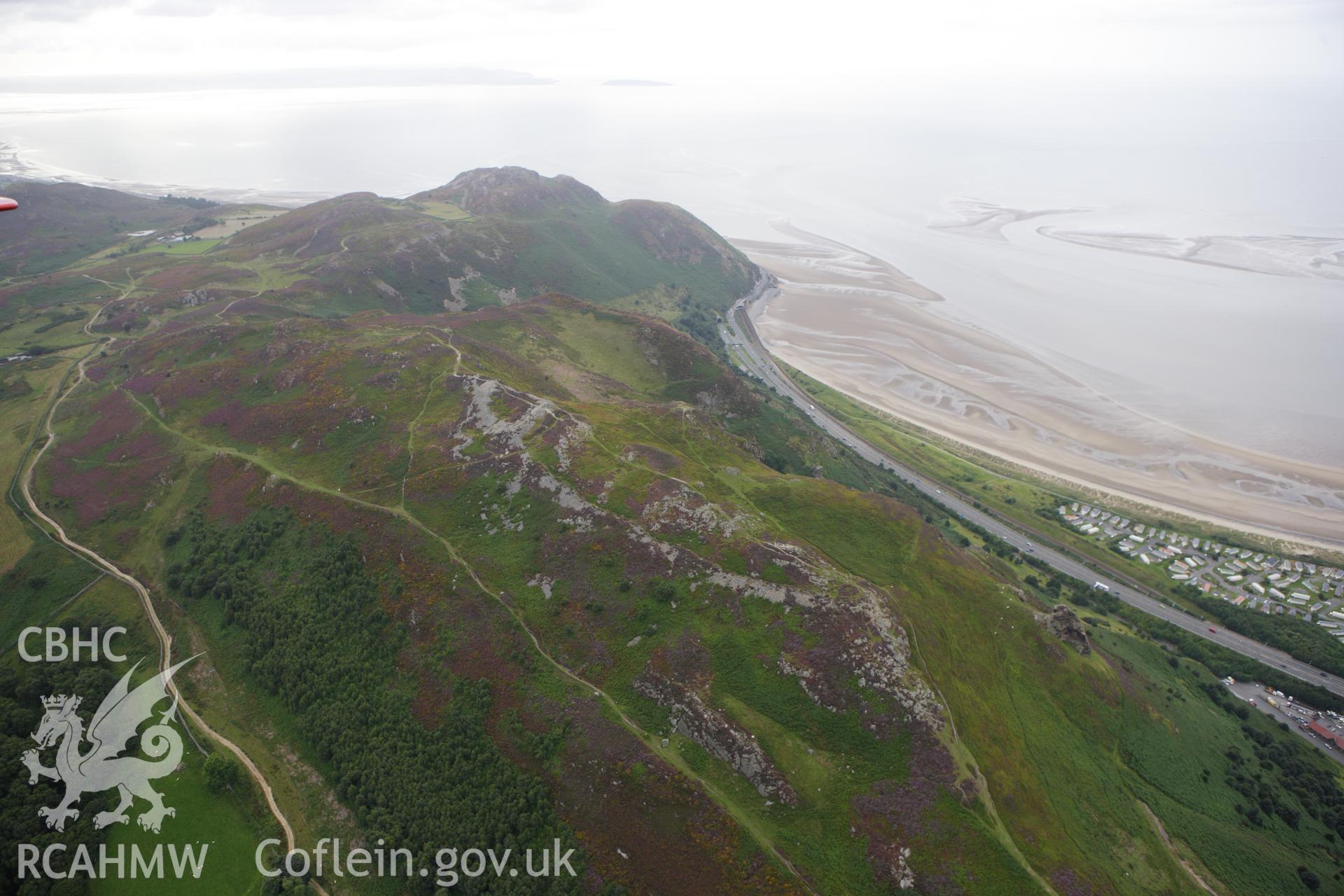 RCAHMW colour oblique aerial photograph of Castell Caer Seion, Conwy Mountain. Taken on 06 August 2009 by Toby Driver