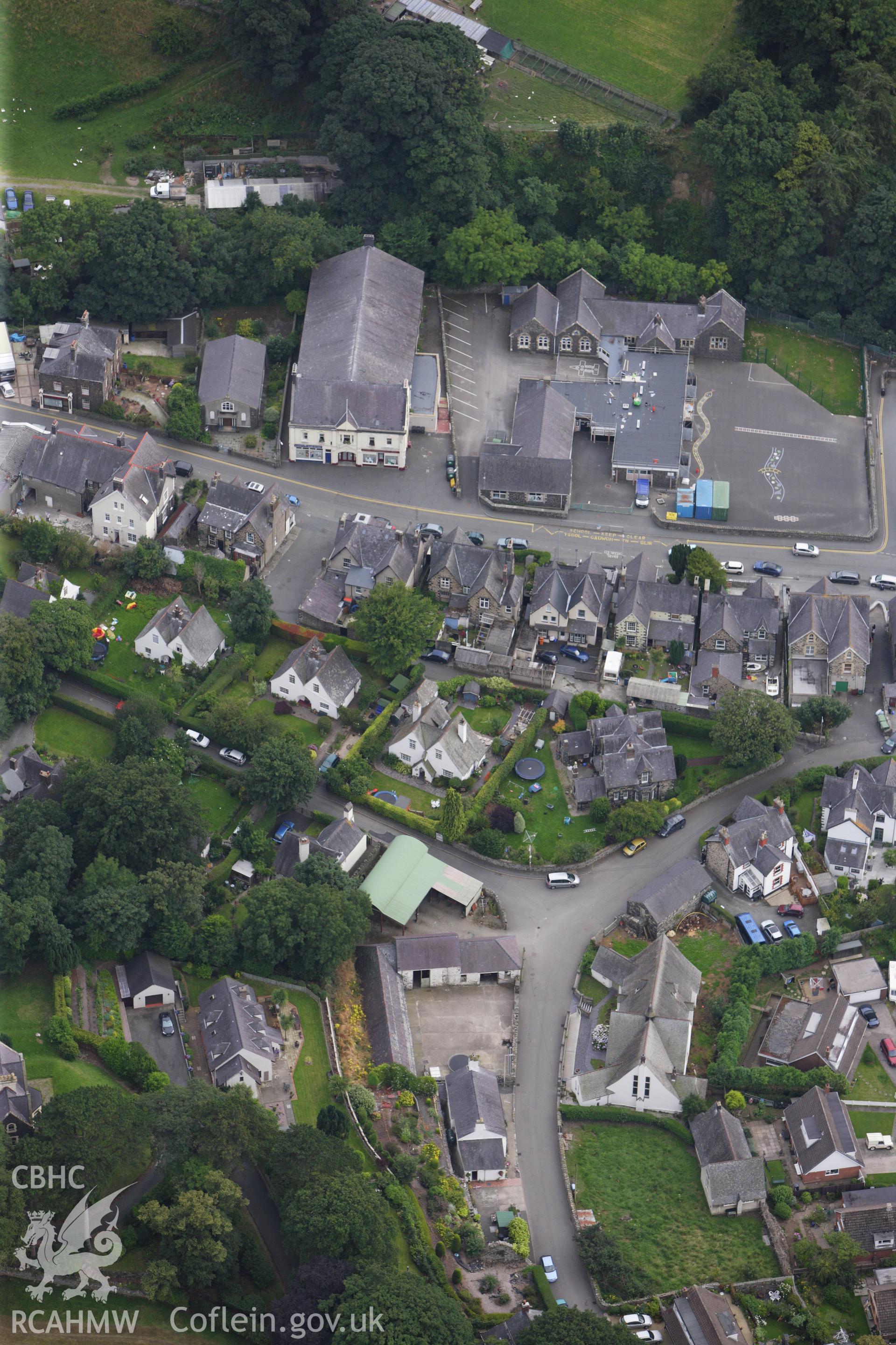 RCAHMW colour oblique aerial photograph of Church Institute, Park Road, Llanfairfechan. Taken on 06 August 2009 by Toby Driver