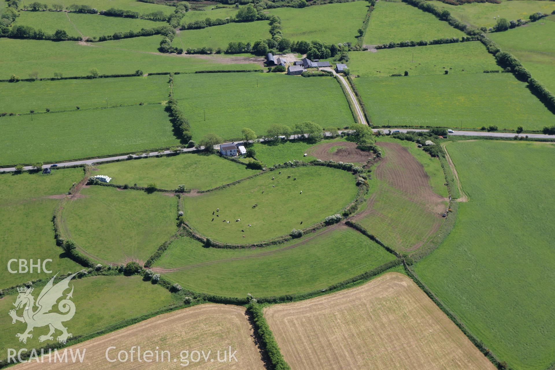 RCAHMW colour oblique aerial photograph of Castell Nadolig. Taken on 01 June 2009 by Toby Driver