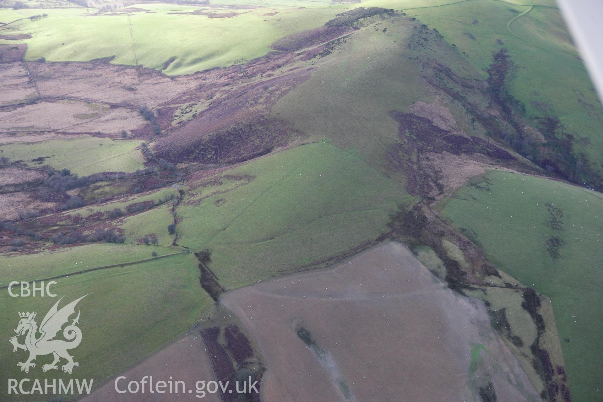 RCAHMW colour oblique aerial photograph of a section of the Monk's Trod from Abbey Cwm Hir to Park and Moel Hywel. Taken on 10 December 2009 by Toby Driver