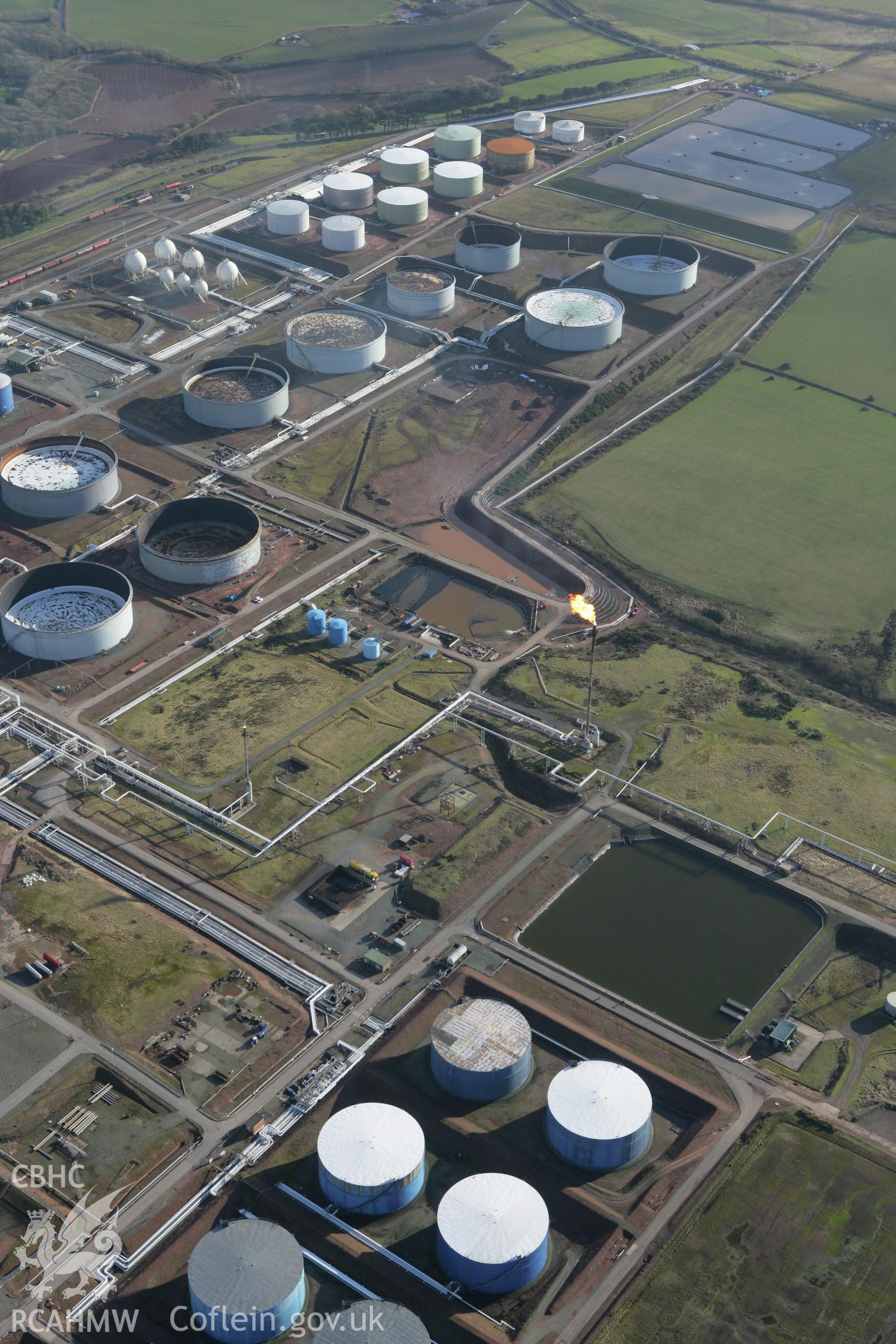 RCAHMW colour oblique photograph of Amoco Oil Refinery, Milford Haven. Taken by Toby Driver on 11/02/2009.
