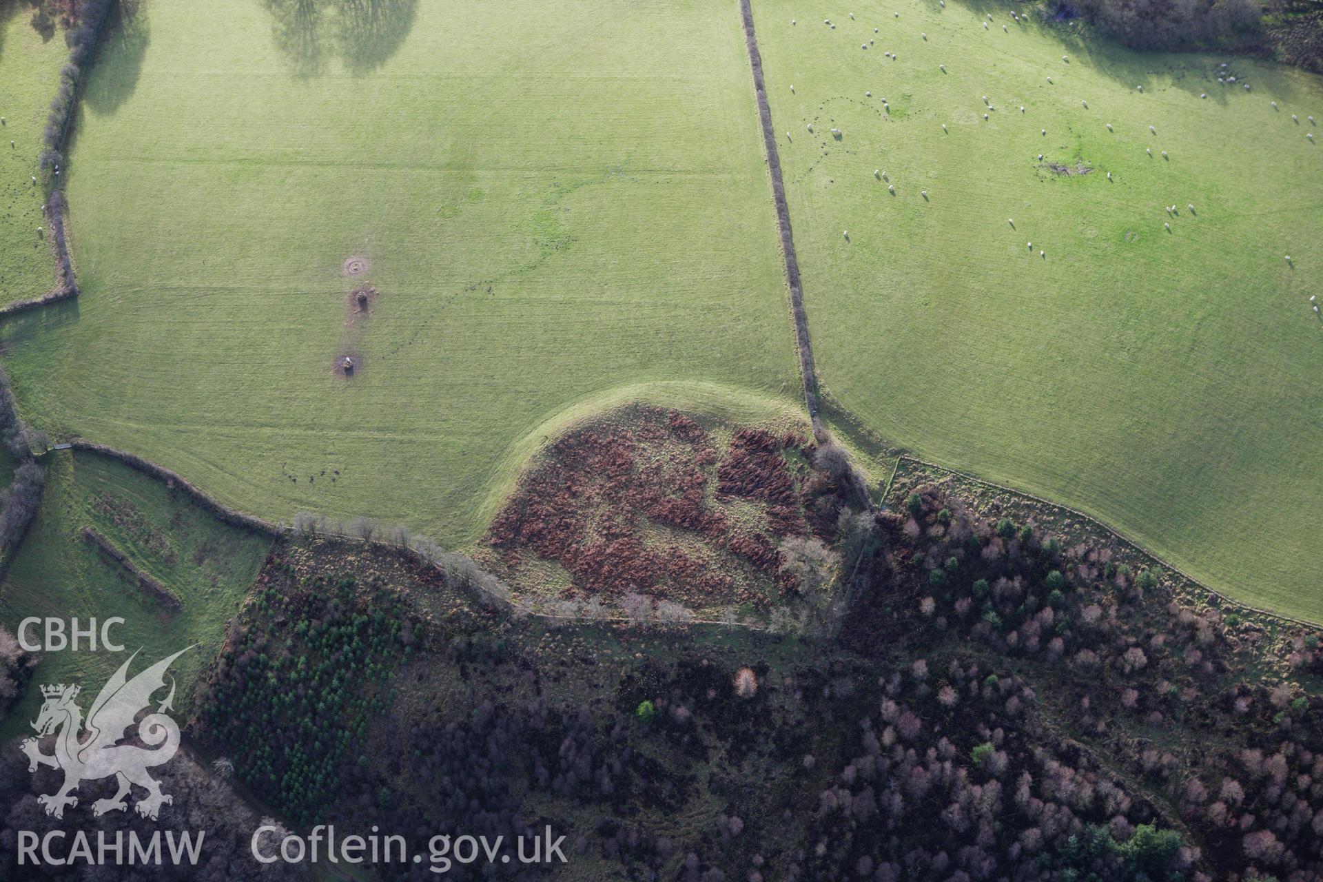 RCAHMW colour oblique aerial photograph of Ty'n-y-Cwm Defended Enclosure. Taken on 10 December 2009 by Toby Driver