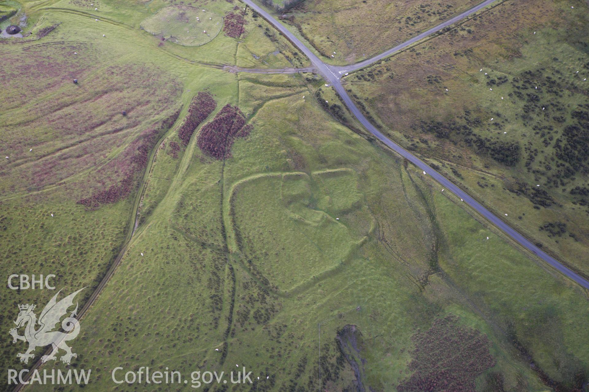 RCAHMW colour oblique aerial photograph of Moelfre Hill Deserted Rural Settlement. Taken on 10 December 2009 by Toby Driver