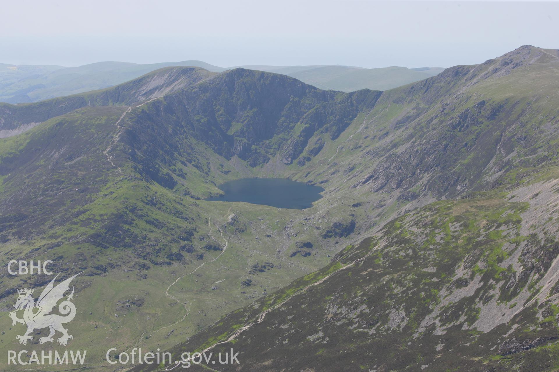 RCAHMW colour oblique aerial photograph of Llyn Cau, Cadair Idris showing landscape view. Taken on 02 June 2009 by Toby Driver