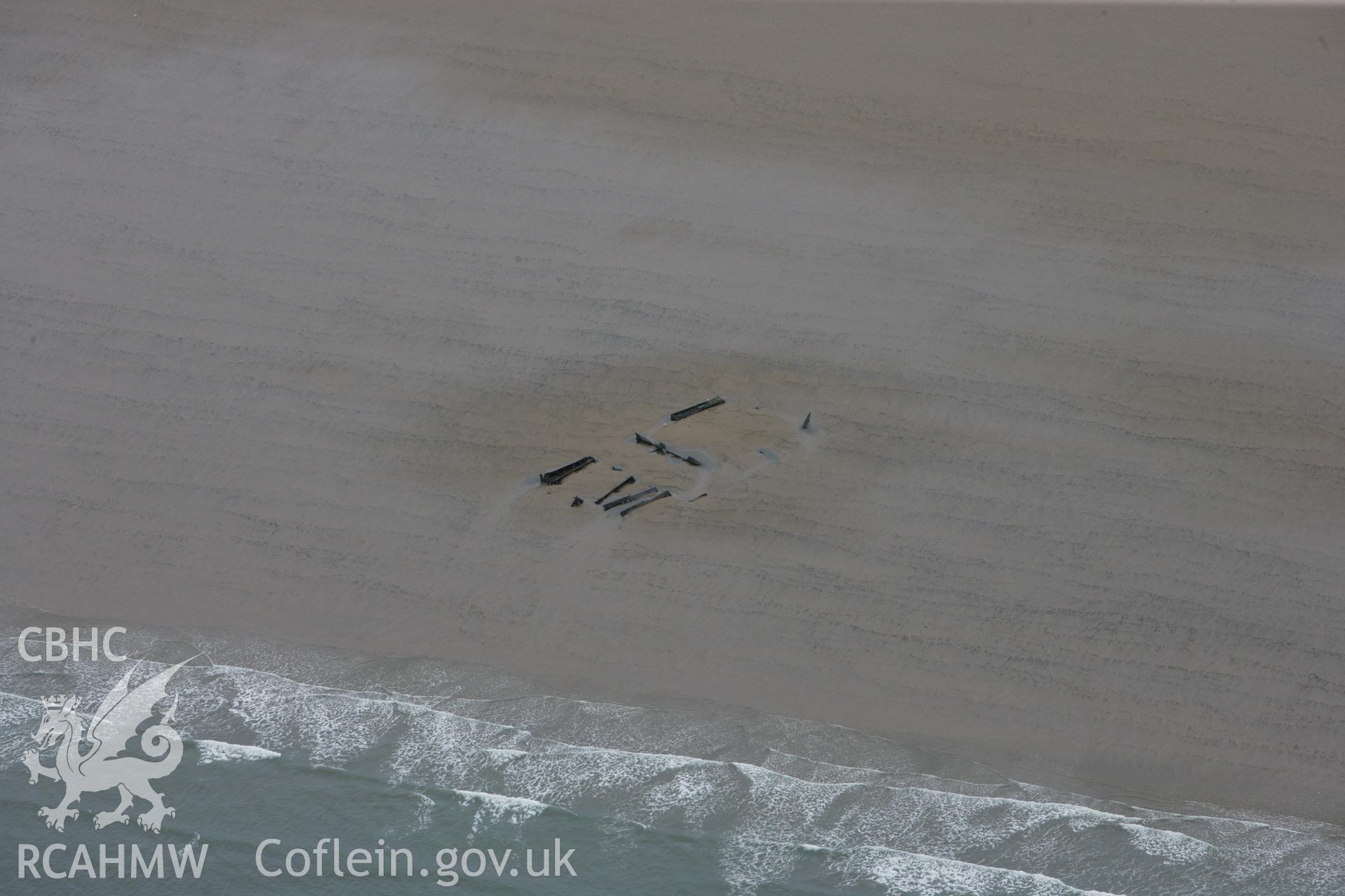 RCAHMW colour oblique aerial photograph of Margam Sands Wreck. Taken on 09 July 2009 by Toby Driver