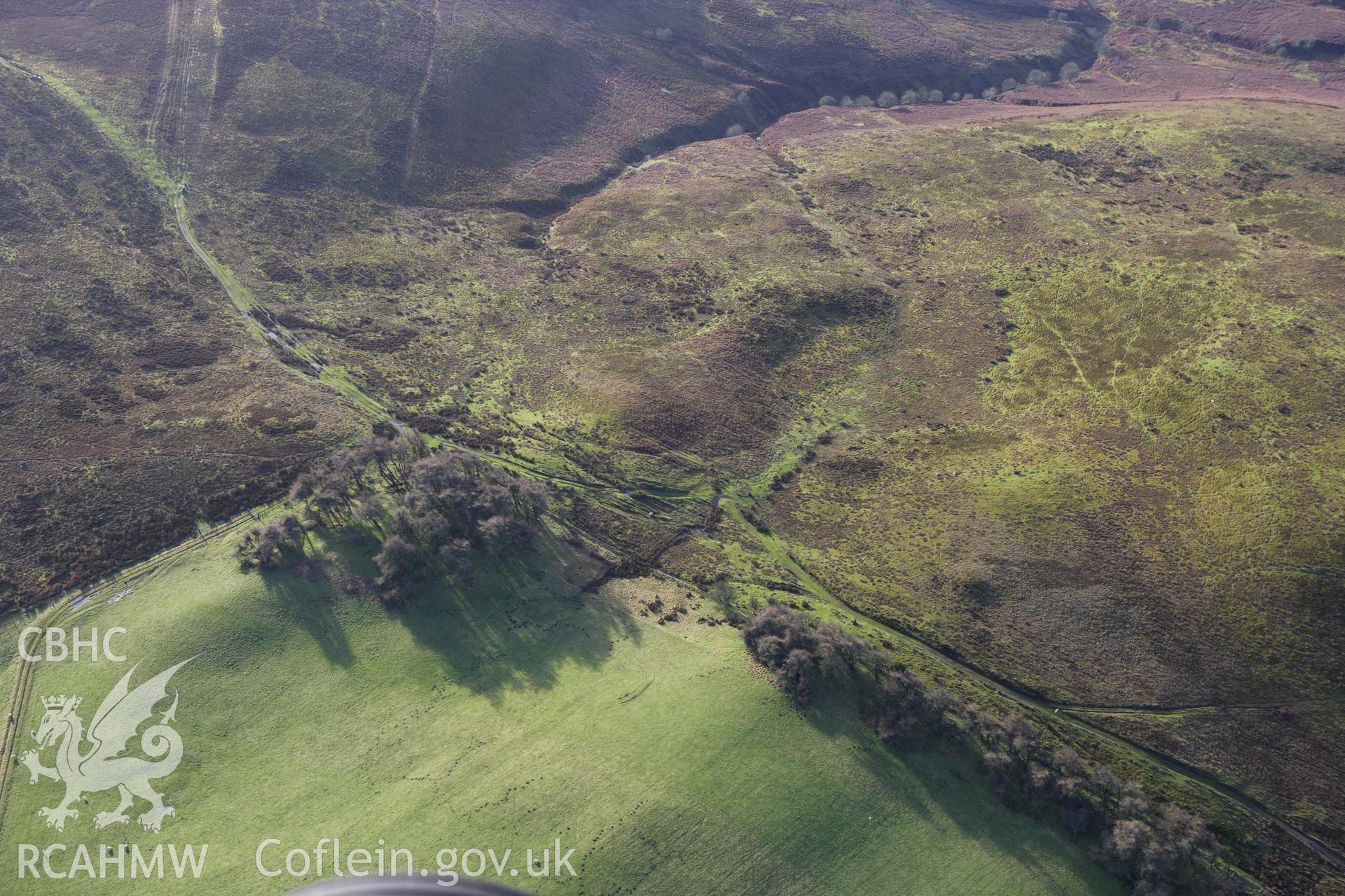 RCAHMW colour oblique aerial photograph of Cae Glas Barrow II. Taken on 10 December 2009 by Toby Driver