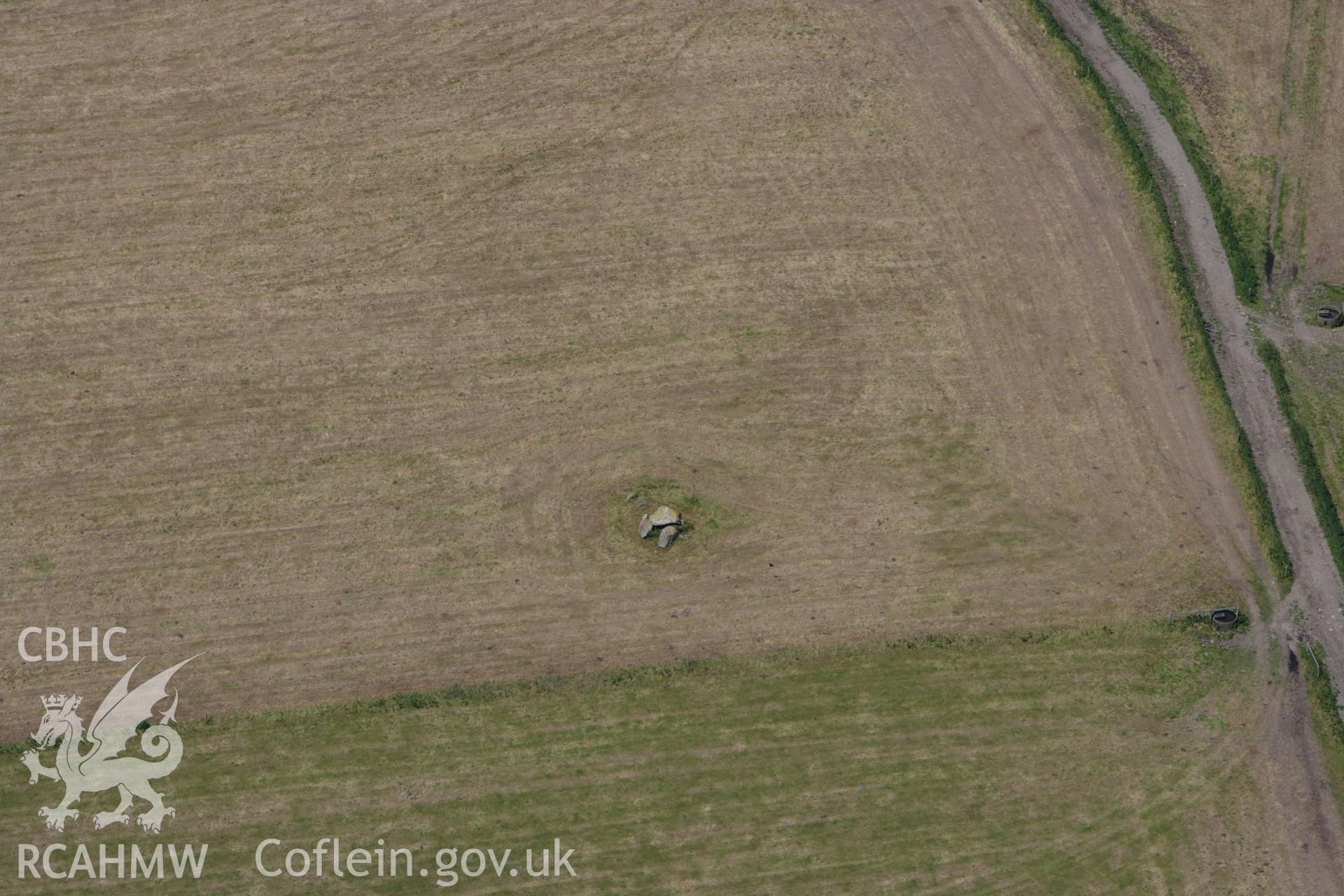 RCAHMW colour oblique aerial photograph of Trellyffaint Burial Chamber. Taken on 01 June 2009 by Toby Driver
