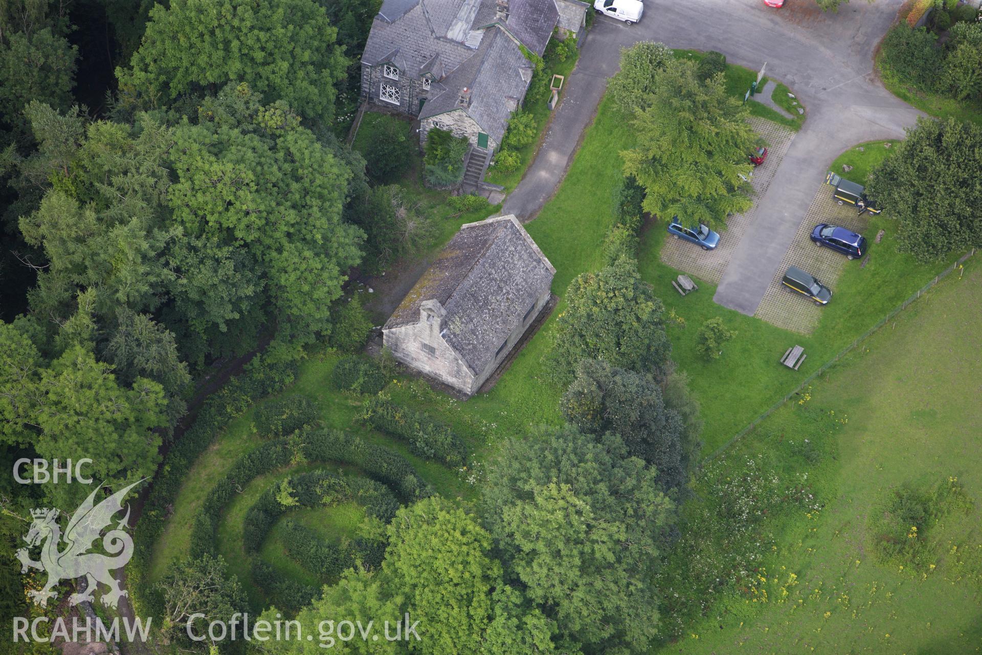 RCAHMW colour oblique aerial photograph of Chapel of Holy Trinity, Llanrychwyn. Taken on 06 August 2009 by Toby Driver