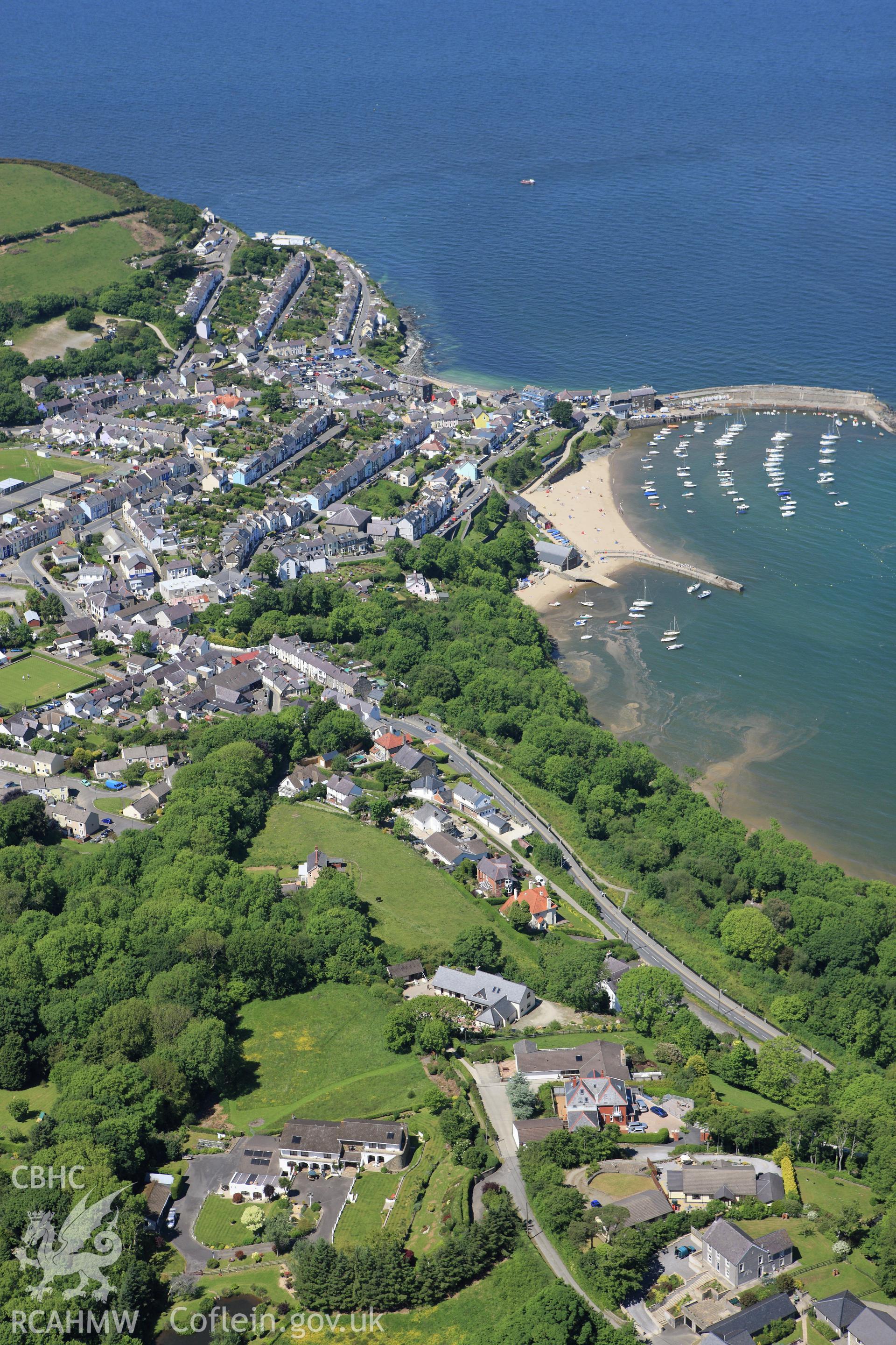 RCAHMW colour oblique aerial photograph of New Quay. Taken on 01 June 2009 by Toby Driver