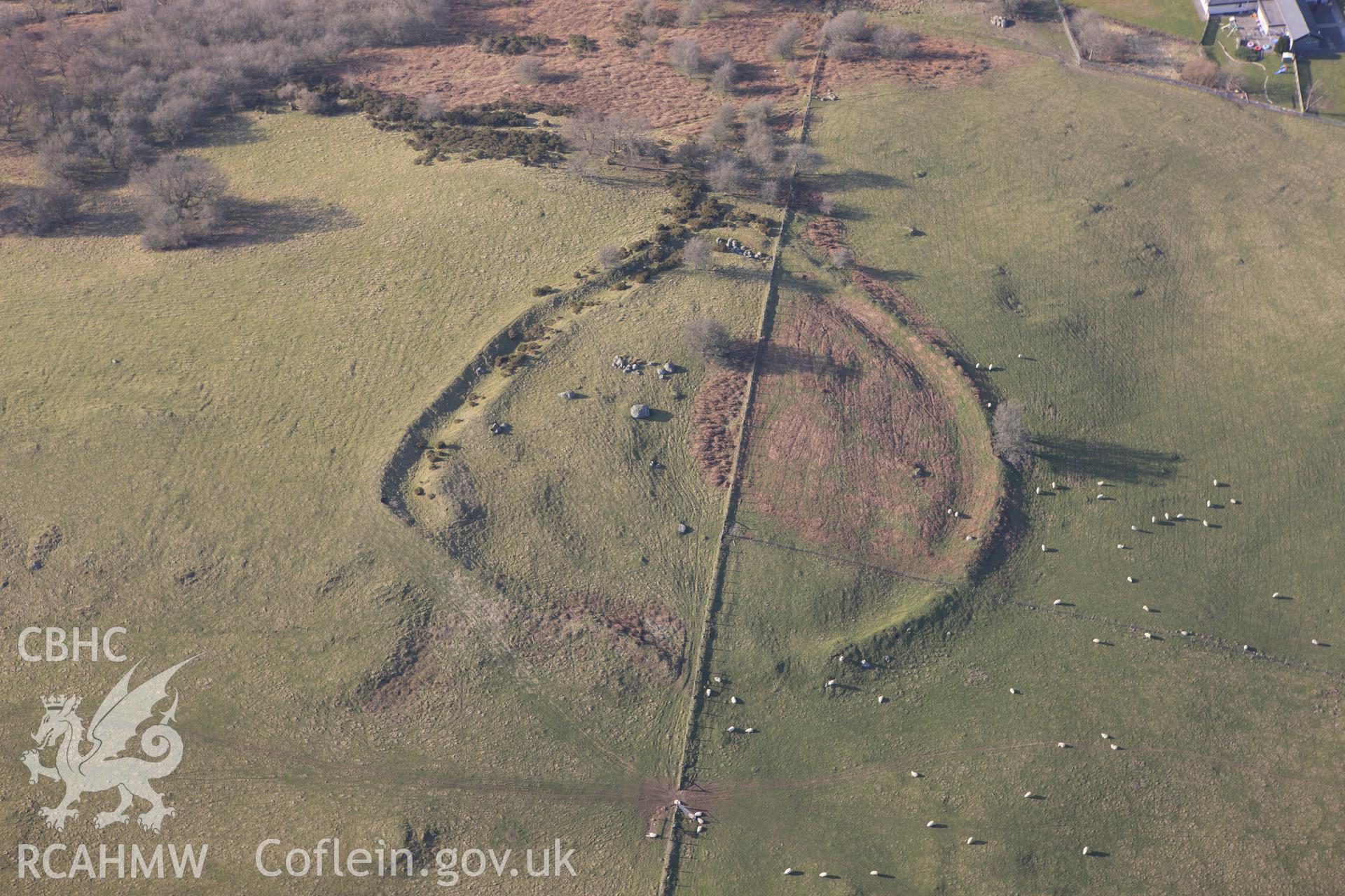 RCAHMW colour oblique photograph of Cefn Ddwysarn camp,. Taken by Toby Driver on 18/03/2009.