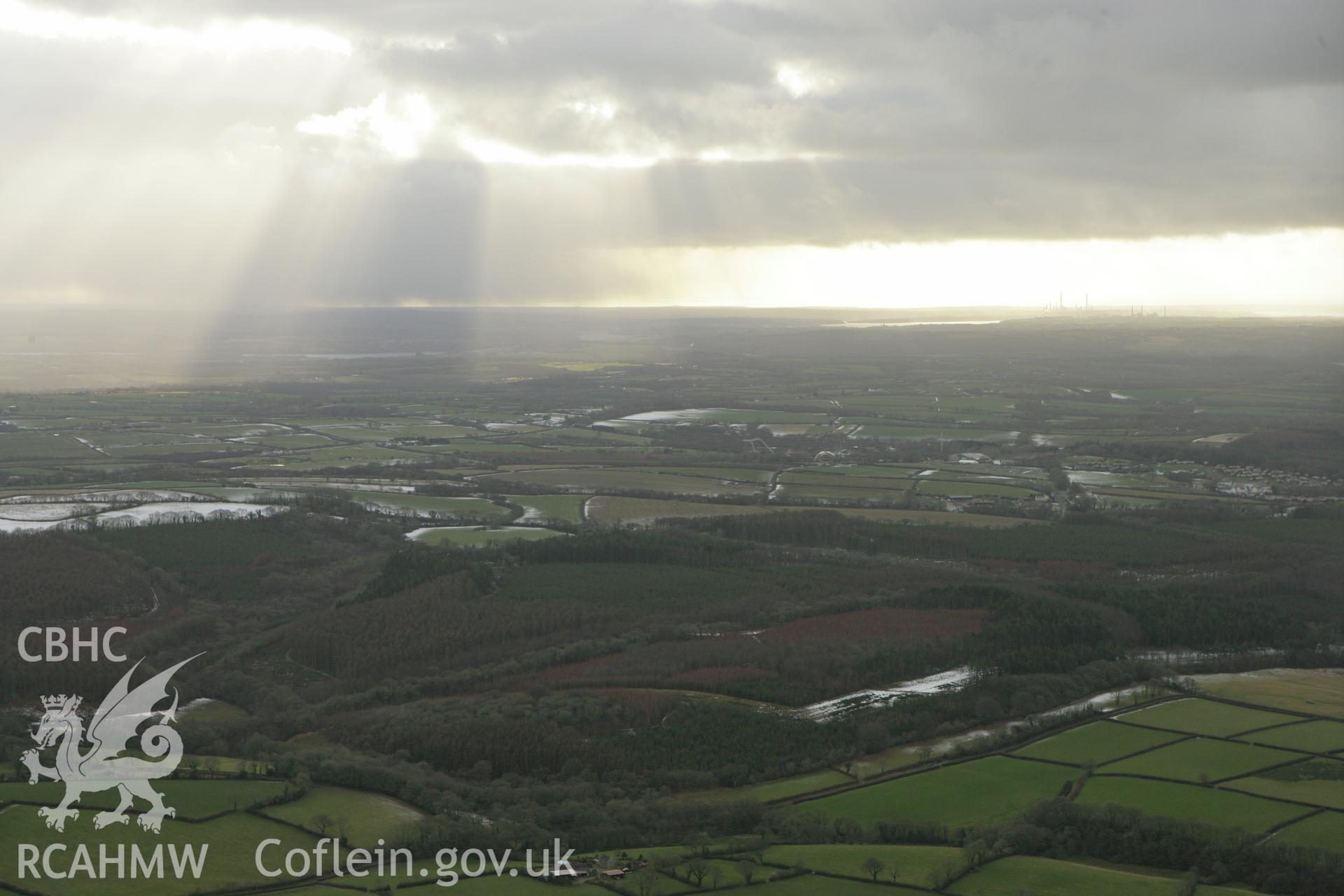 RCAHMW colour oblique photograph of Winter landscape over Oakwood theme park, looking west. Taken by Toby Driver on 06/02/2009.