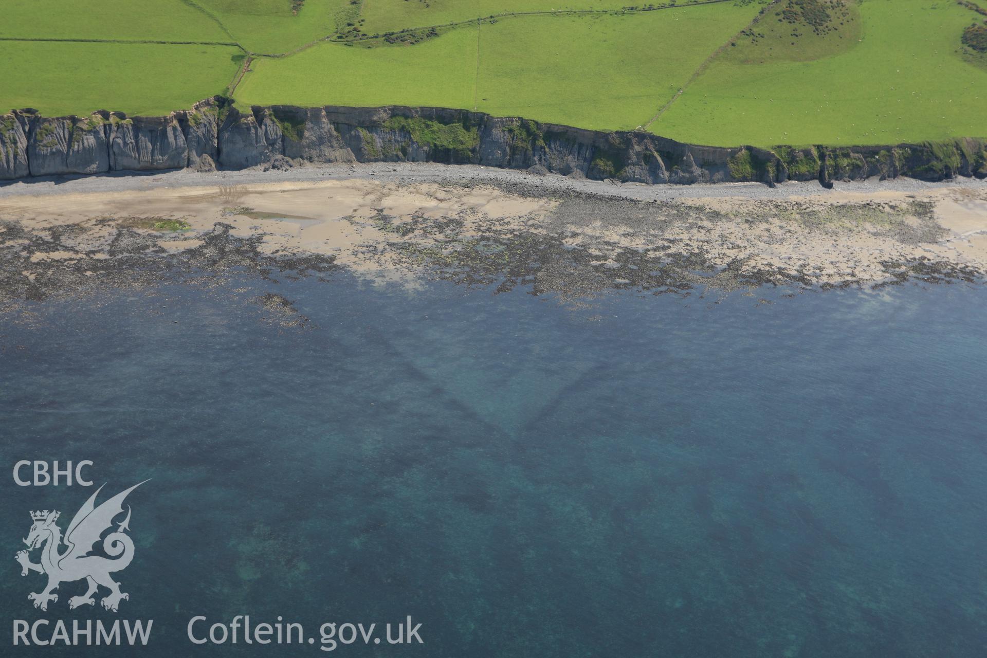 RCAHMW colour oblique aerial photograph of Mynachdy'r-Graig Fish Trap I. Taken on 02 June 2009 by Toby Driver