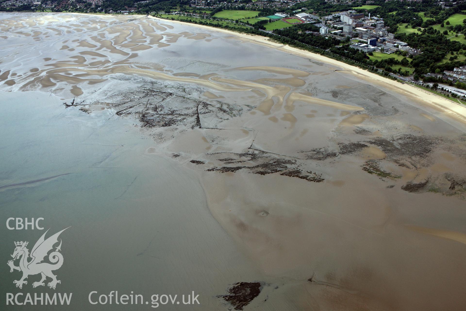 RCAHMW colour oblique aerial photograph of Swansea Bay Fish Traps. Taken on 09 July 2009 by Toby Driver