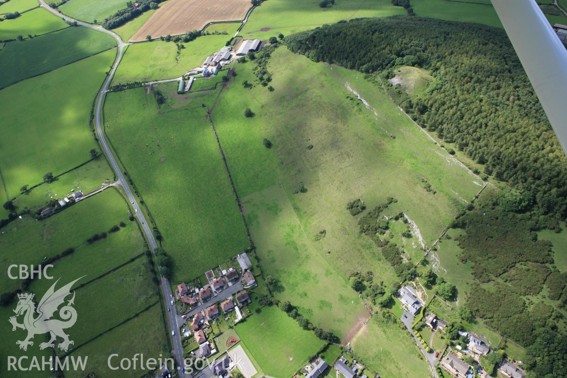 RCAHMW colour oblique aerial photograph of a section of Offa's Dyke or Whitford Dyke southeast of Gop Farm. Taken on 30 July 2009 by Toby Driver