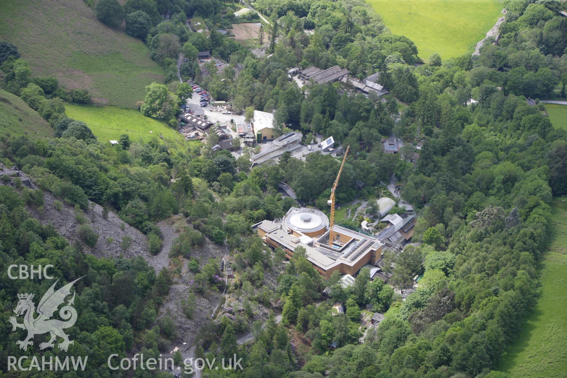 RCAHMW colour oblique aerial photograph of Centre For Alternative Technology, Llwyngwern Quarry, Machynlleth. Taken on 02 June 2009 by Toby Driver