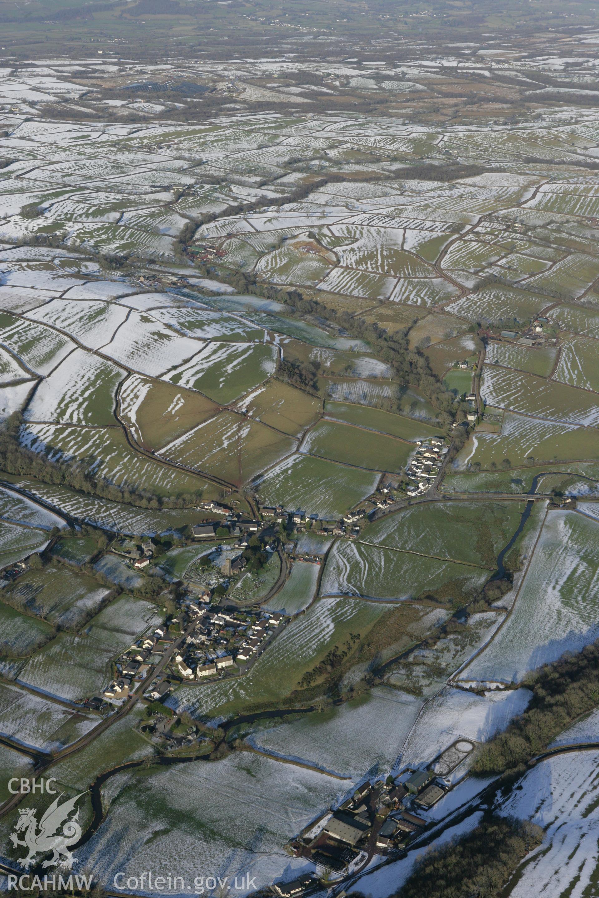 RCAHMW colour oblique photograph of Llangynderyn, village, view looking north-east. Taken by Toby Driver on 06/02/2009.