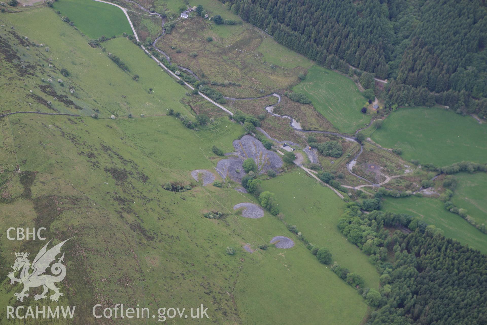 RCAHMW colour oblique aerial photograph of Cymerau Slate Quarry. Taken on 02 June 2009 by Toby Driver