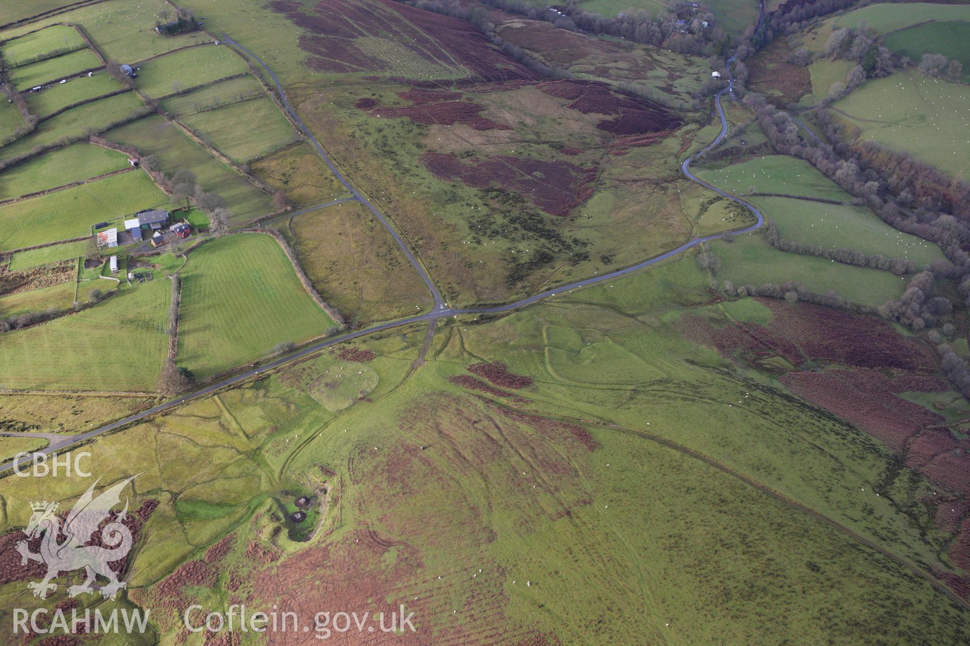 RCAHMW colour oblique aerial photograph of Moelfre Hill Deserted Rural Settlement. Taken on 10 December 2009 by Toby Driver