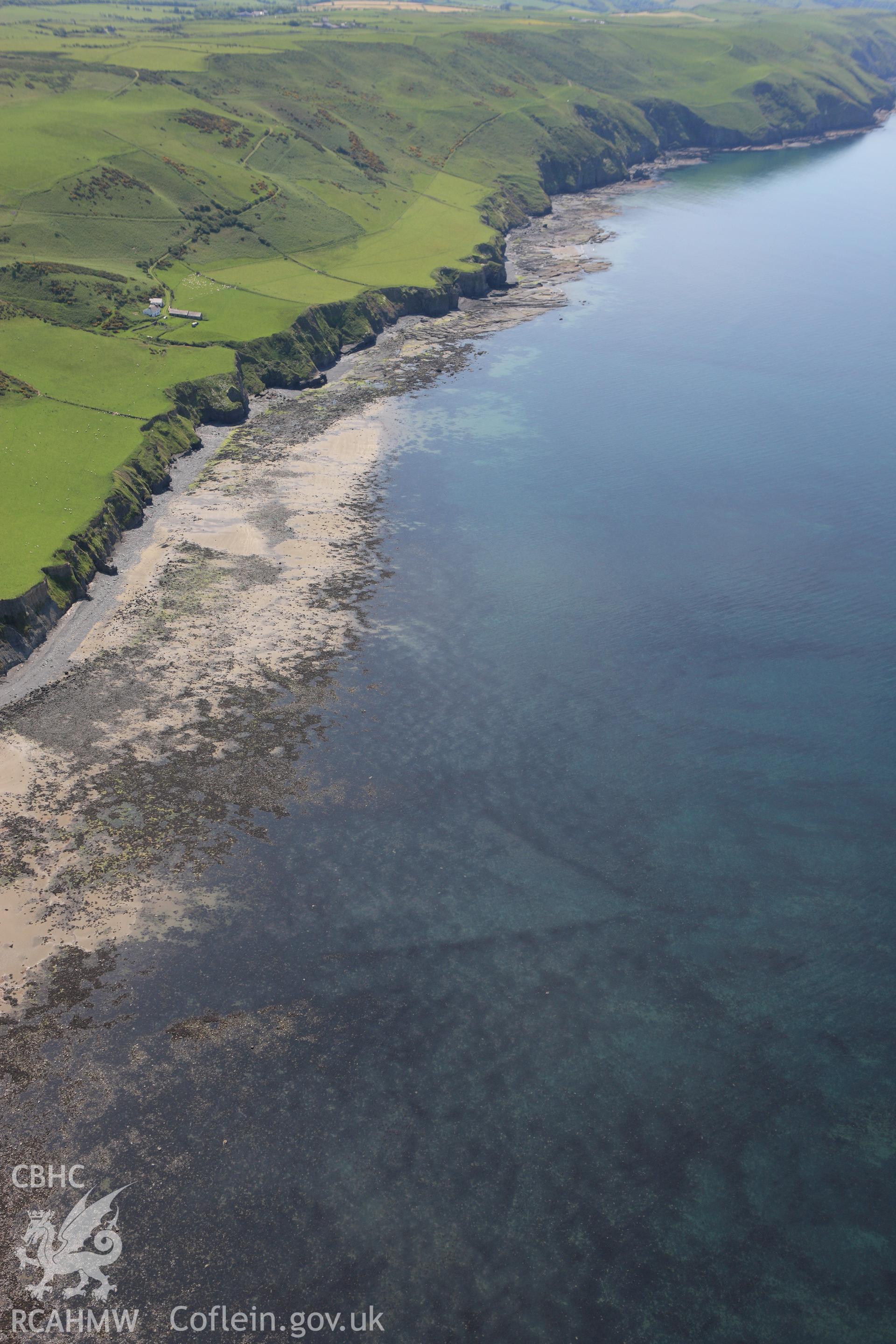 RCAHMW colour oblique aerial photograph of Mynachdy'r-Graig Fish Trap I. Taken on 02 June 2009 by Toby Driver