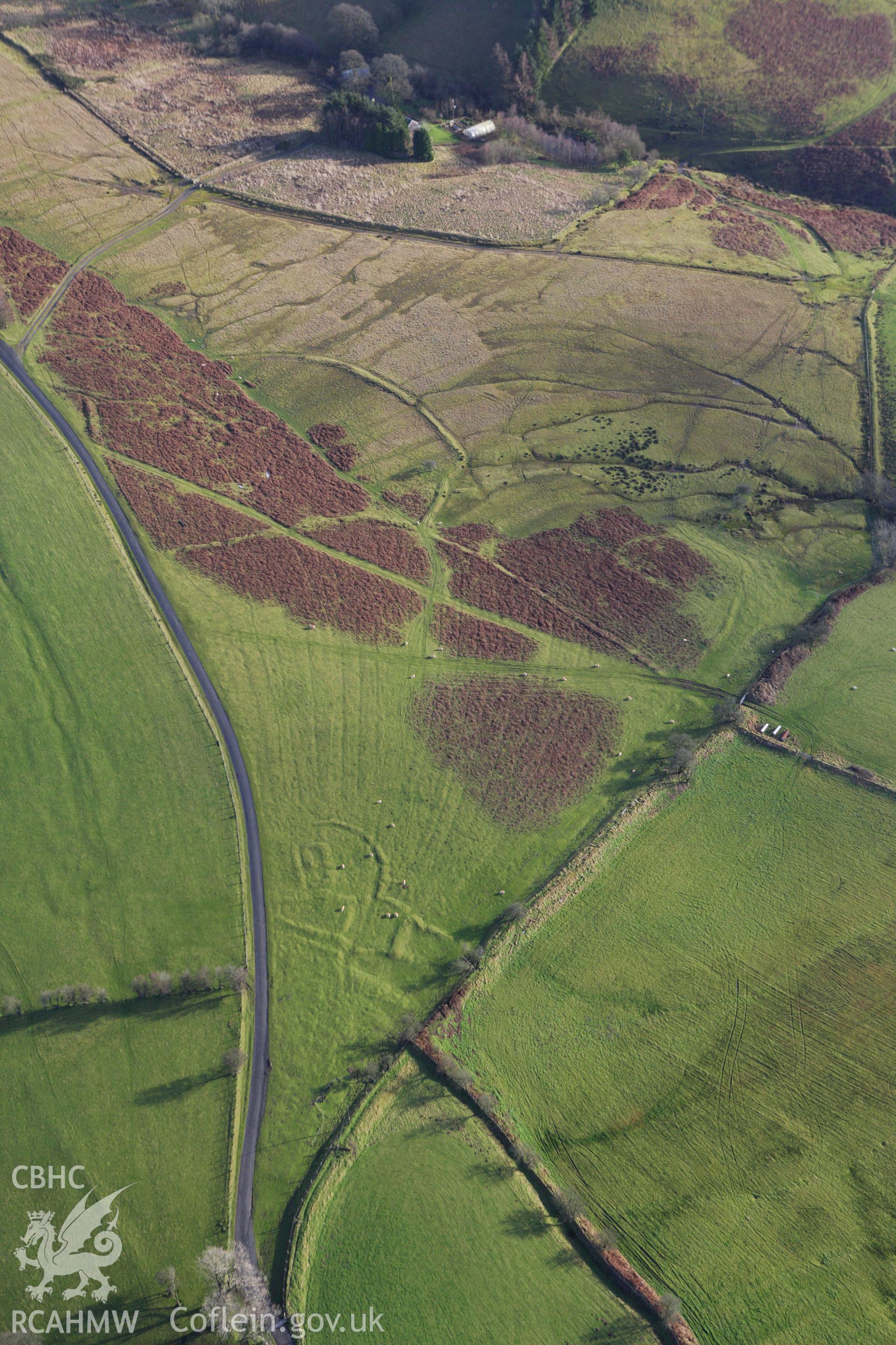 RCAHMW colour oblique aerial photograph of the western part of Fron Top Deserted Rural Settlement. Taken on 10 December 2009 by Toby Driver