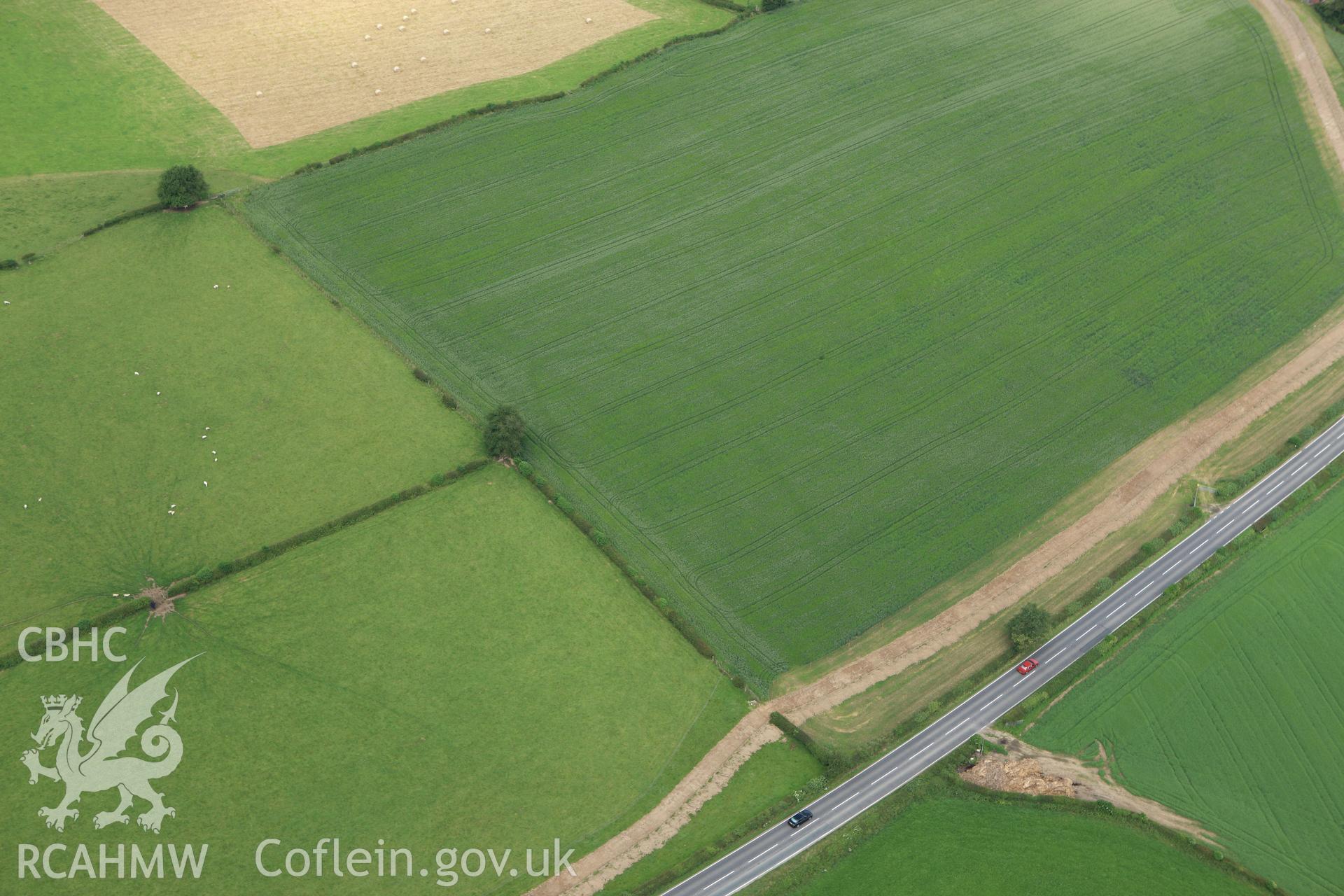 RCAHMW colour oblique aerial photograph of Lower Luggy Cursus, Dyffryn Lane. Taken on 29 June 2009 by Toby Driver