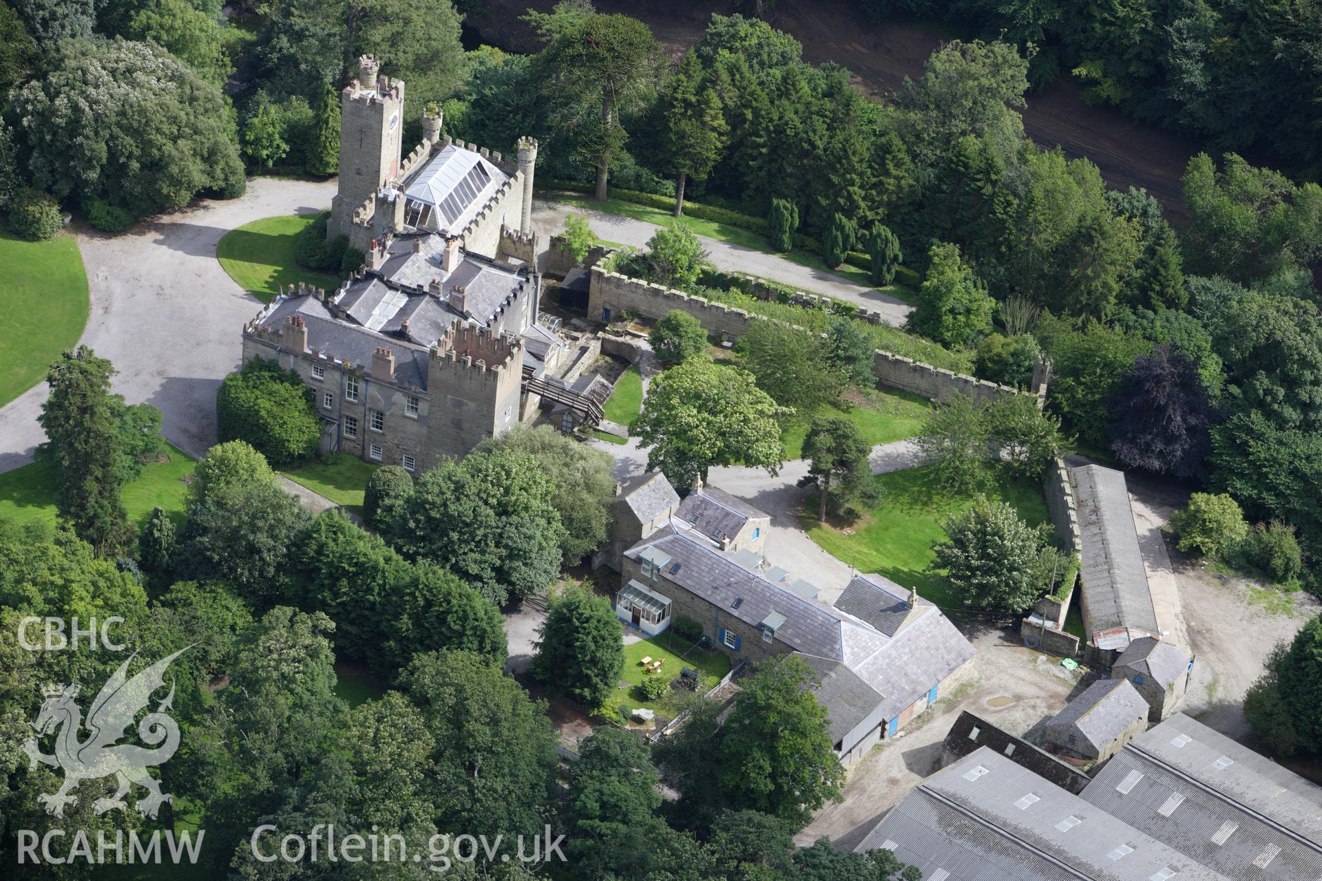RCAHMW colour oblique aerial photograph of Gyrn Castle Grounds and Gardens. Taken on 30 July 2009 by Toby Driver
