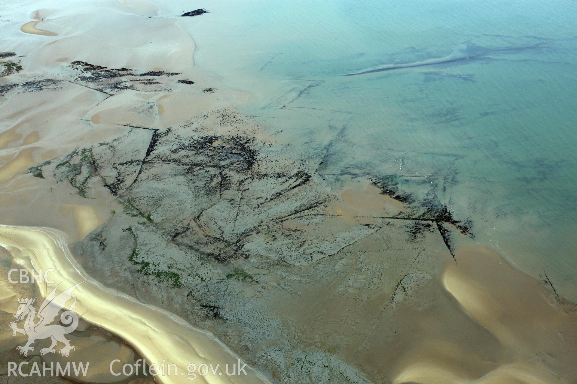 RCAHMW colour oblique aerial photograph of Swansea Bay Fish Traps. Taken on 09 July 2009 by Toby Driver