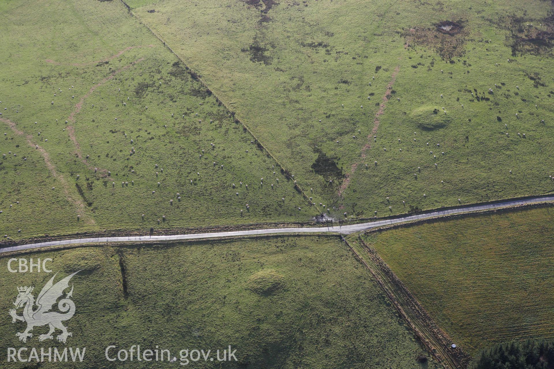 RCAHMW colour oblique aerial photograph of Rhiw Porthnant Barrow I. Taken on 10 December 2009 by Toby Driver