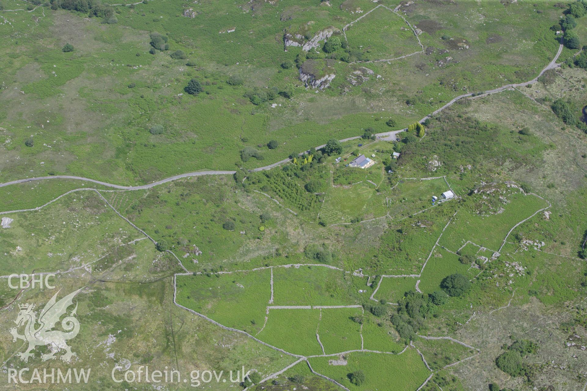 RCAHMW colour oblique aerial photograph of a hut group near Galltycelyn, south of Cwm-y-Glo. Taken on 16 June 2009 by Toby Driver