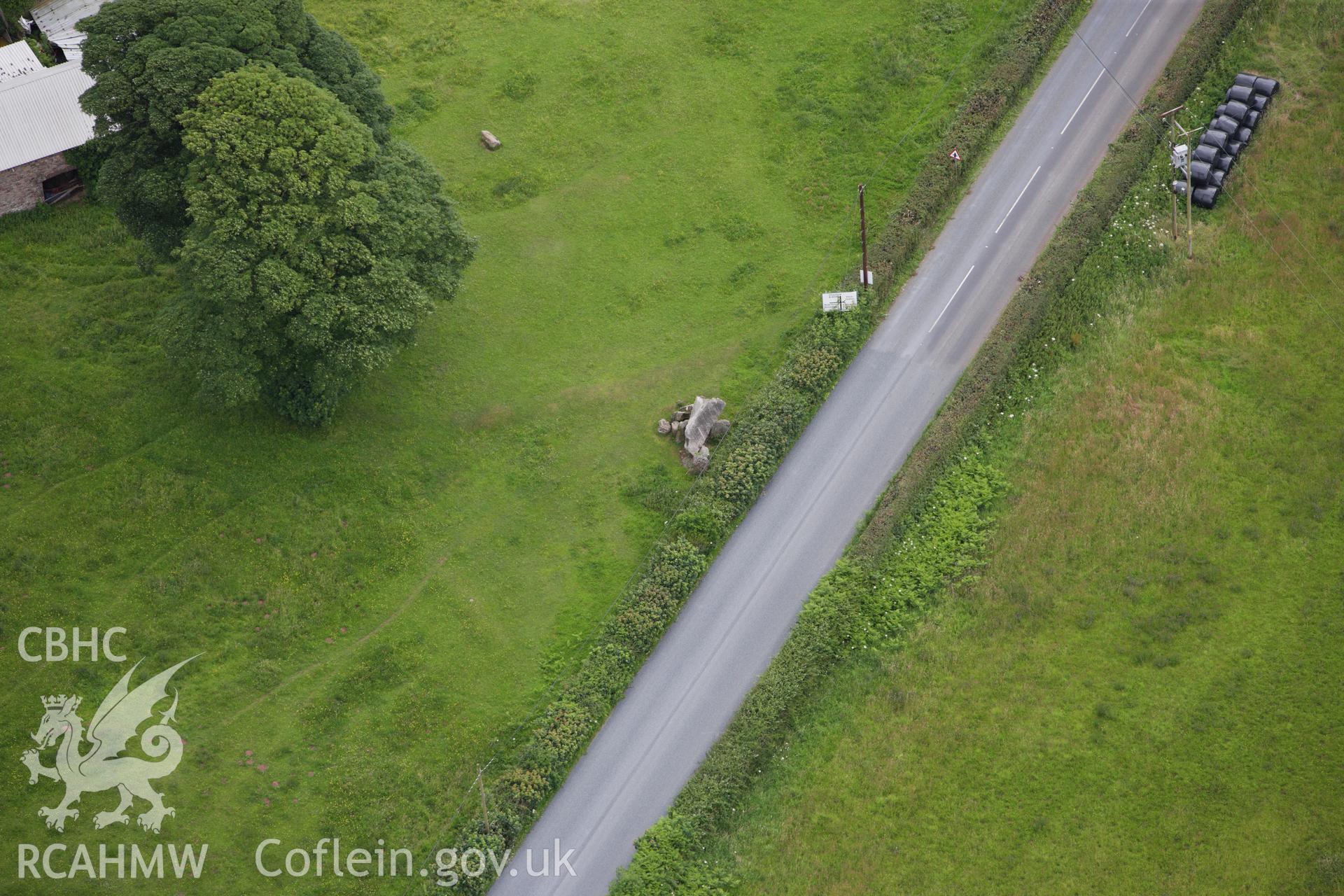 RCAHMW colour oblique aerial photograph of Gaerllwyd Burial Chamber. Taken on 09 July 2009 by Toby Driver