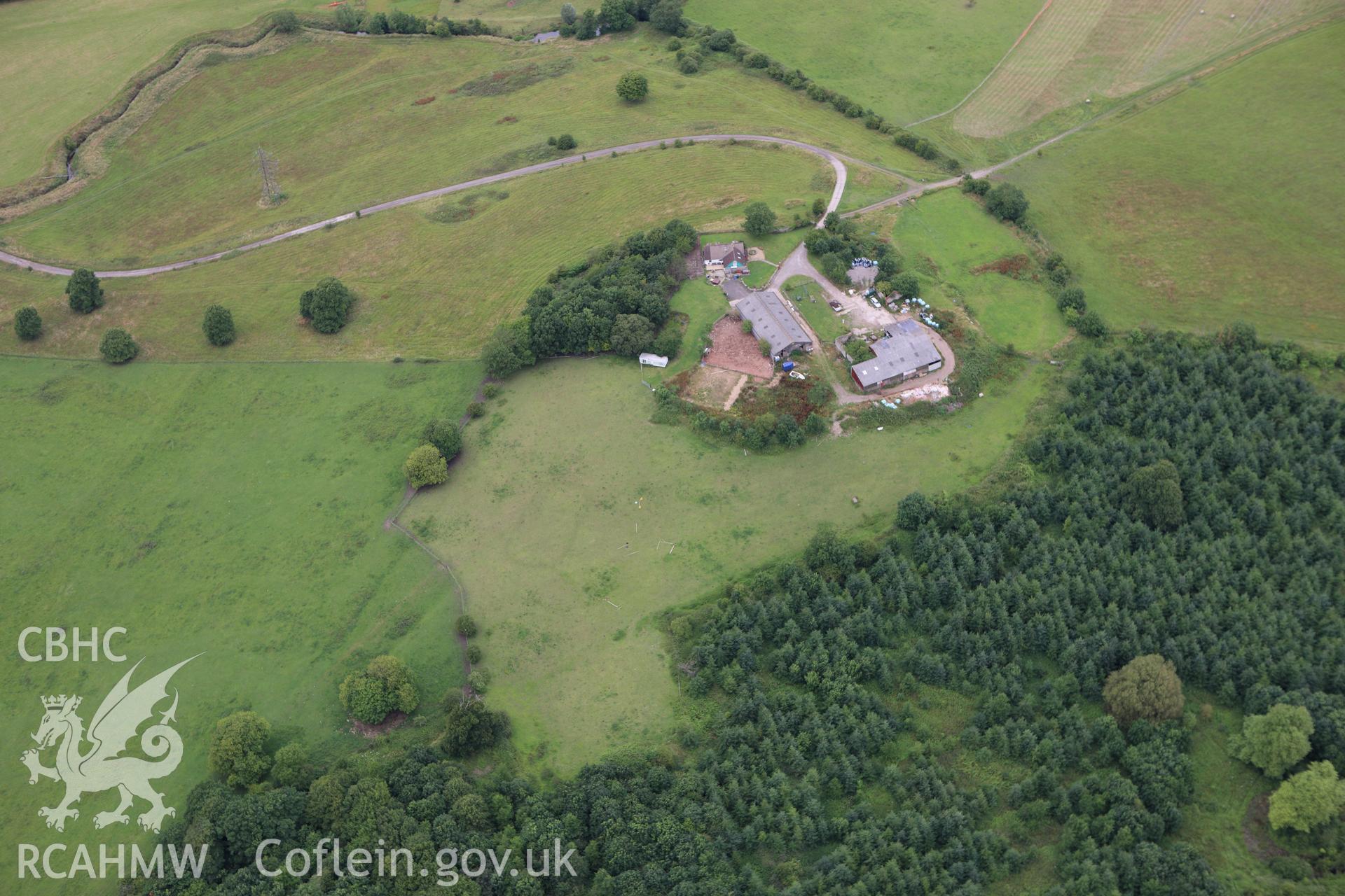 RCAHMW colour oblique aerial photograph of Llanwern Park, with cropmarks of dressage ring. Taken on 09 July 2009 by Toby Driver