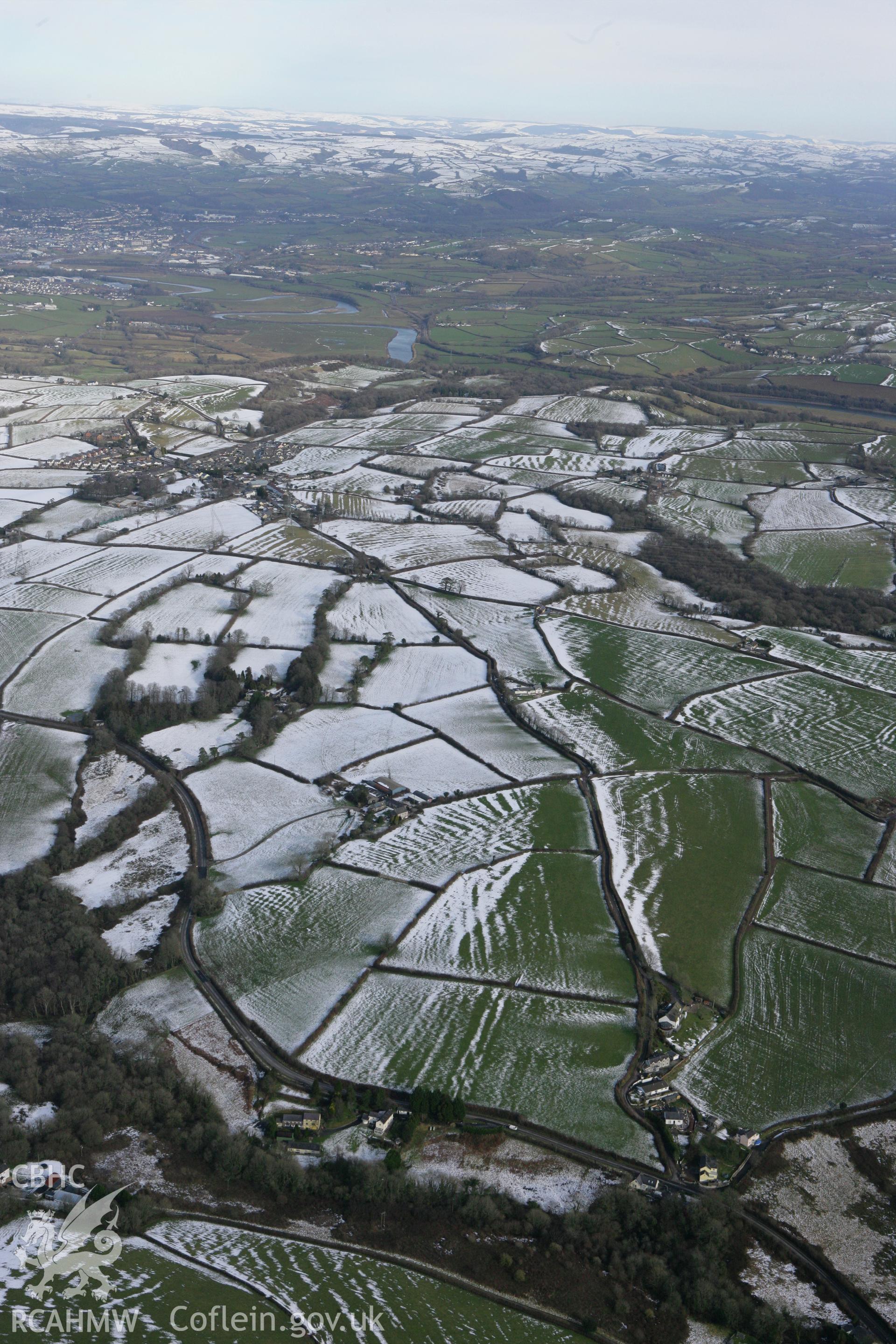 RCAHMW colour oblique photograph of Llangain village from south. Taken by Toby Driver on 06/02/2009.
